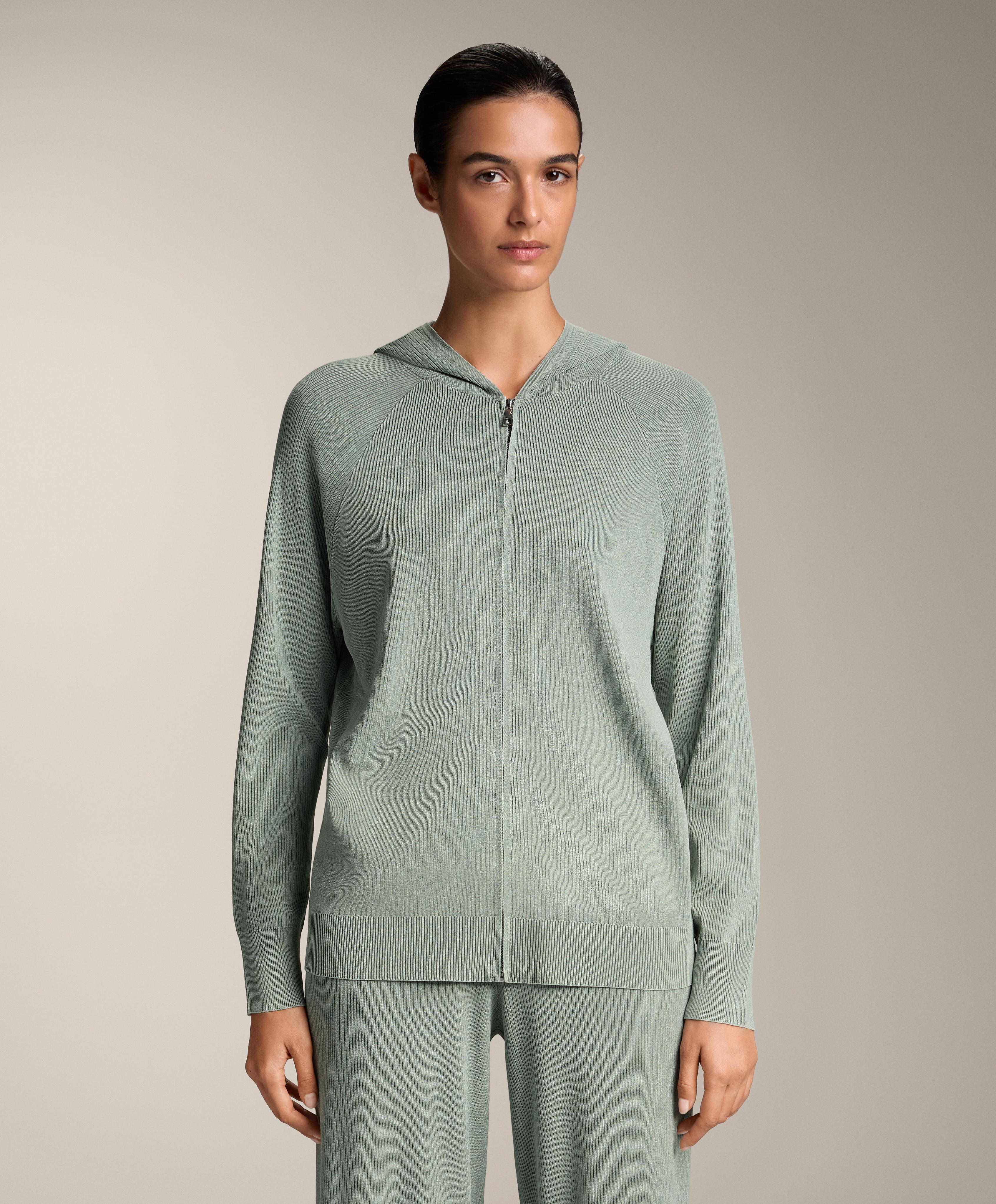 Chaqueta larga punto con capucha