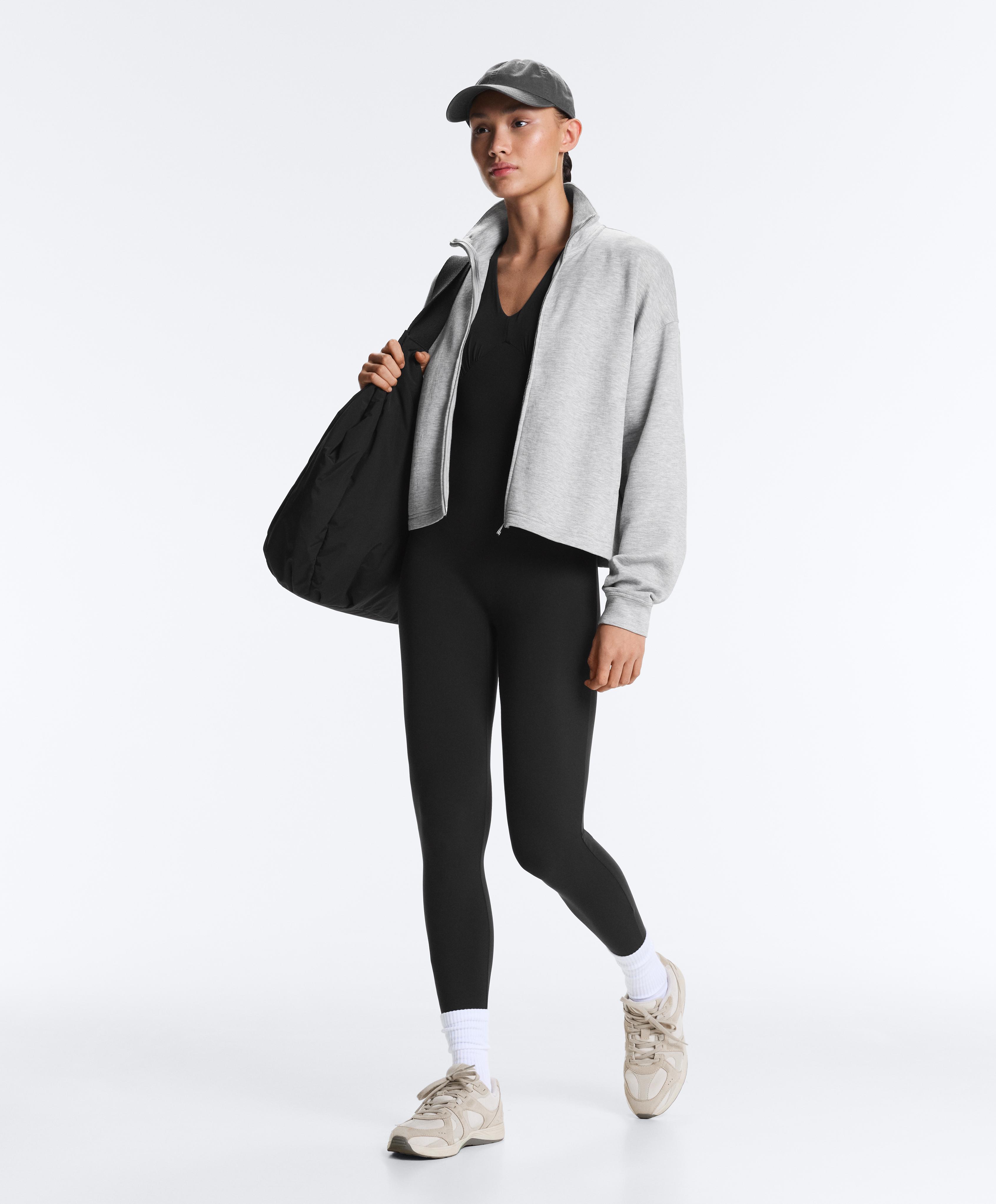 Light Touch V-neck jumpsuit — BLACK