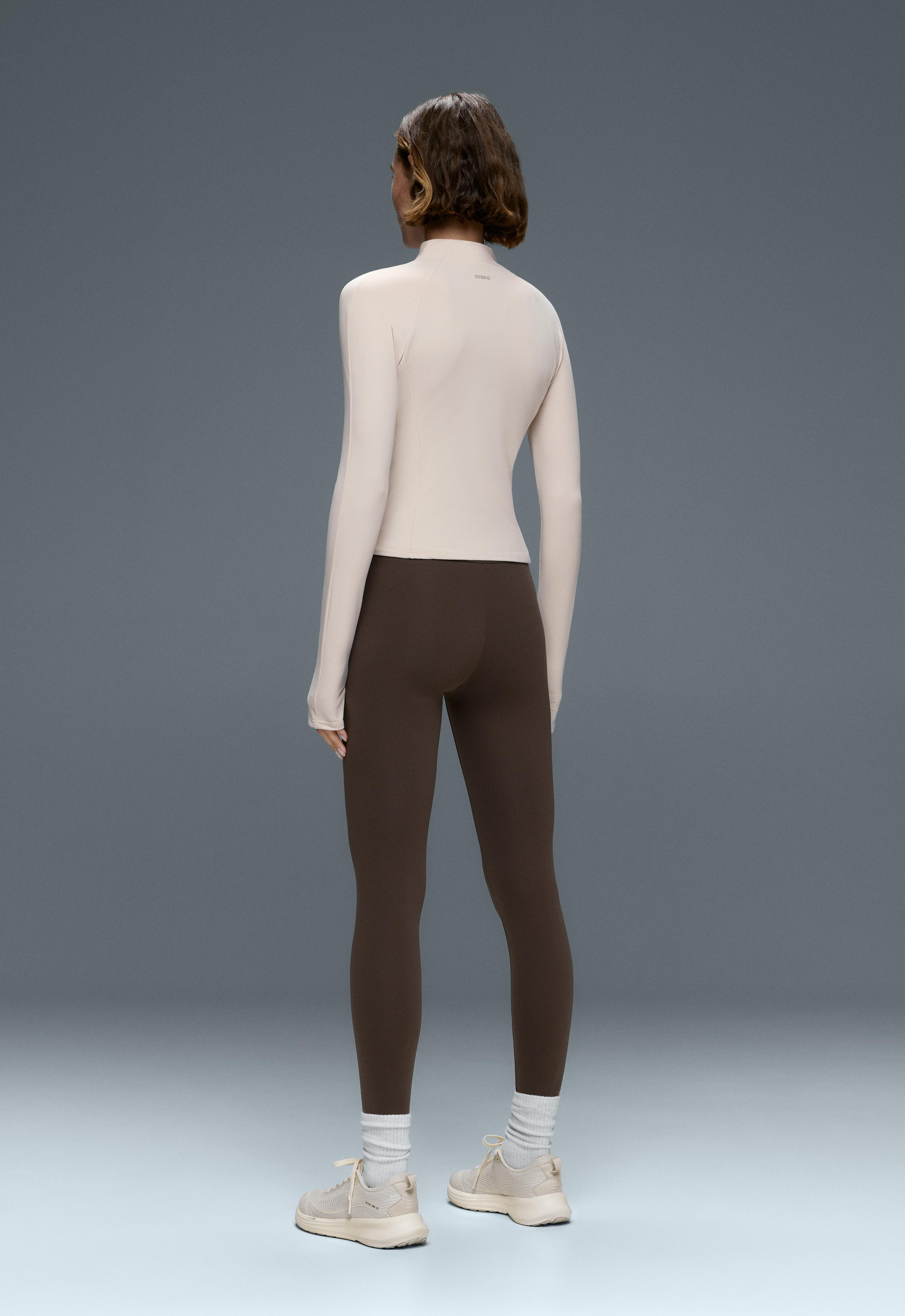 Short light warm technical jacket — PALE MINK