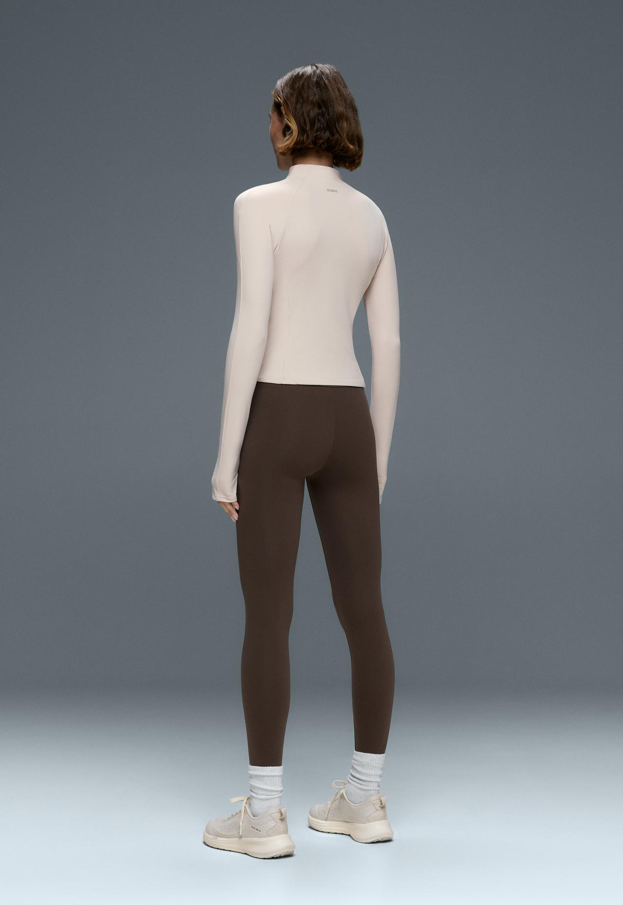 Short light warm technical jacket — PALE MINK