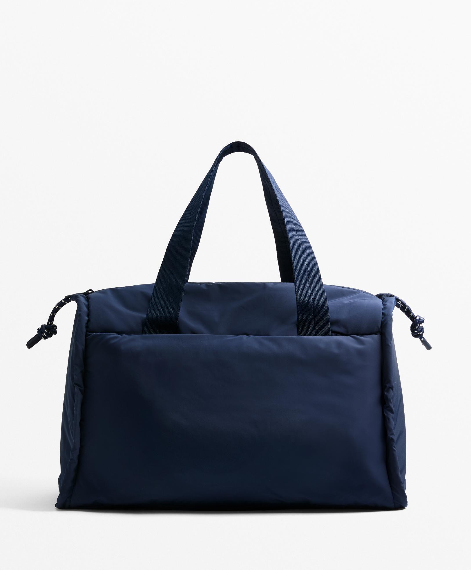 Sac porte tapis avec poche avant