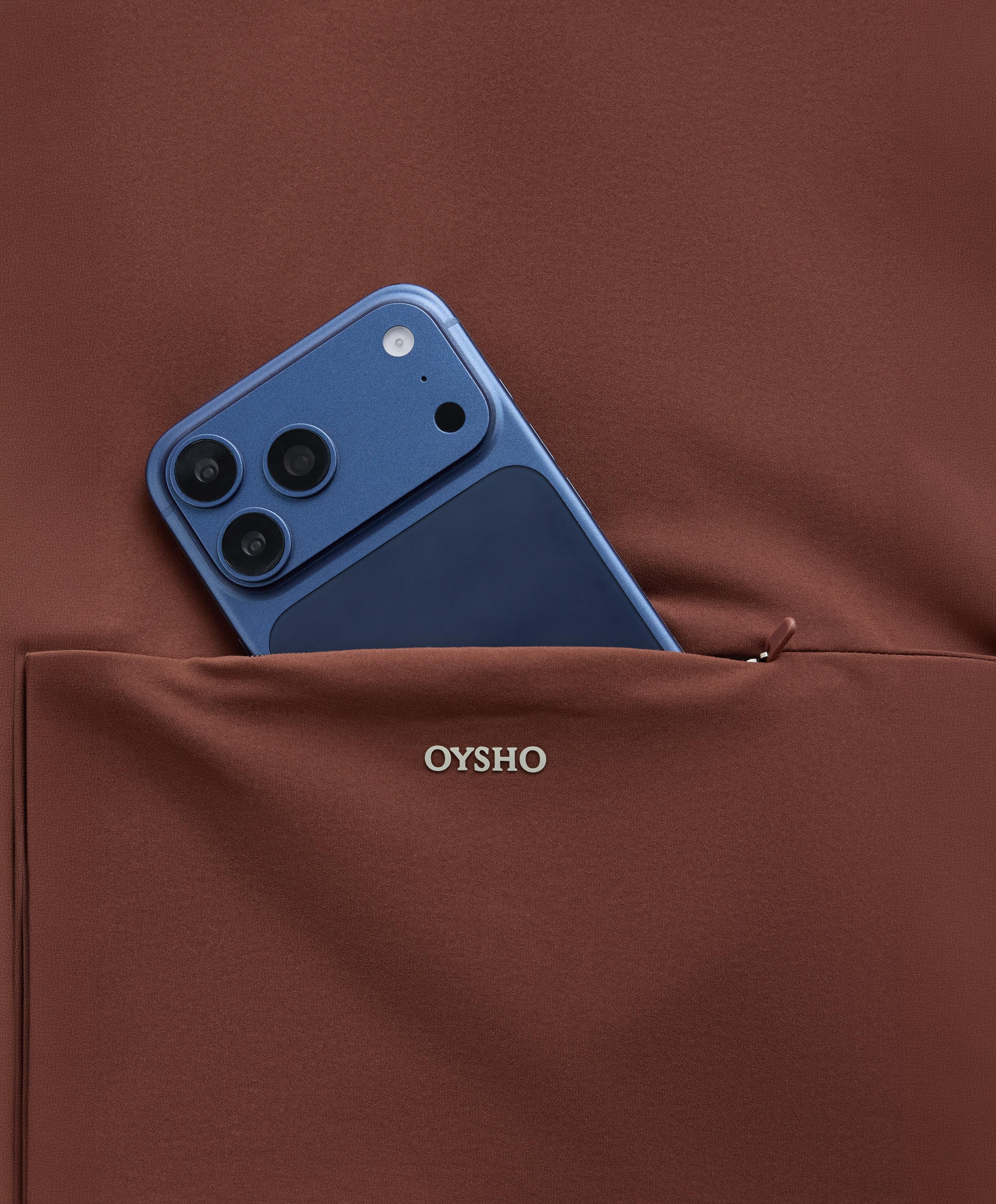 Light warm colour-block technical jacket — TERRACOTTA