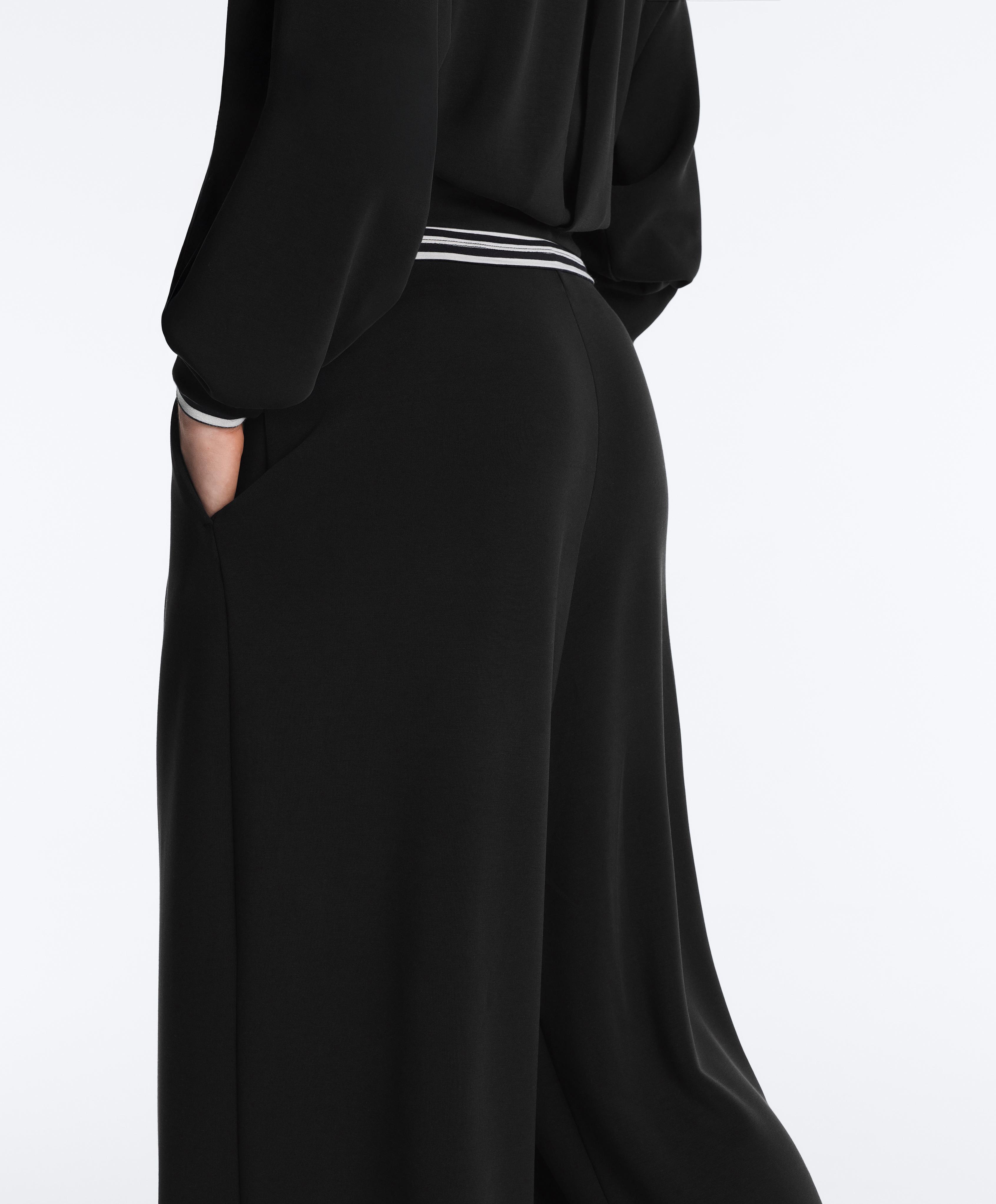 Long wide-leg trousers with soft touch modal and pleats — BLACK
