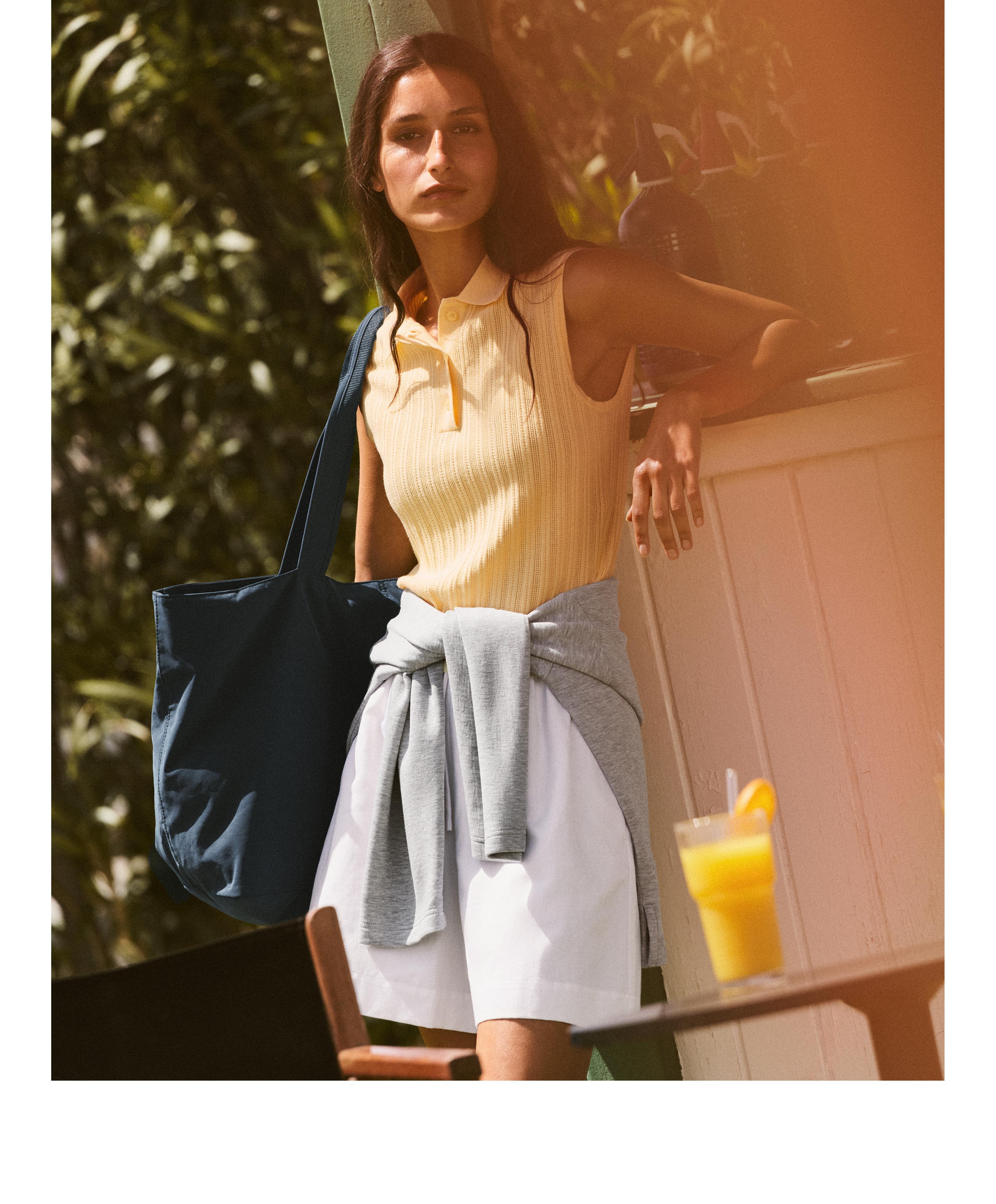 Sleeveless open knit jumper Sleeveless open knit jumper