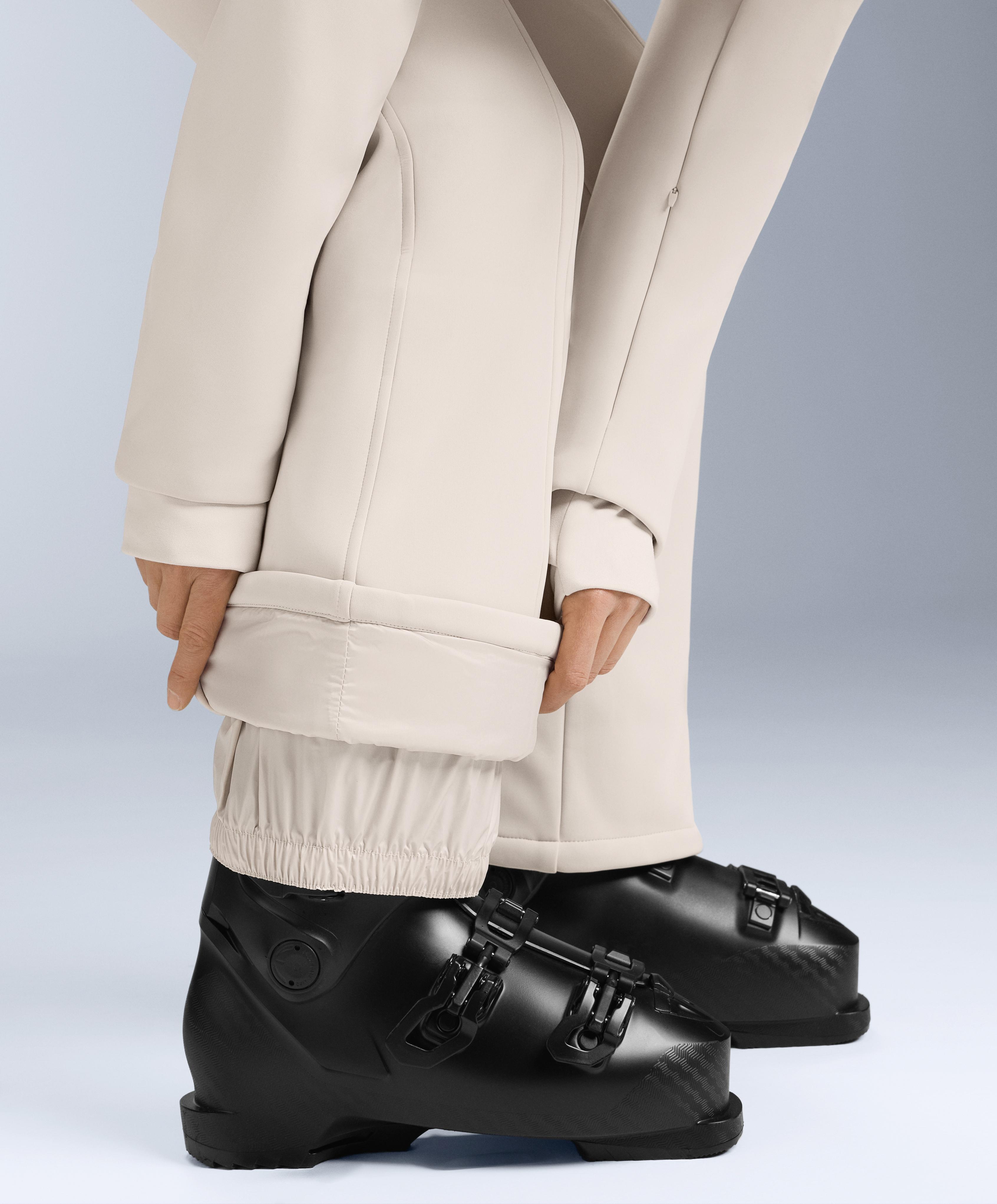 Water-resistant fitted stretch SKI jumpsuit — PALE MINK
