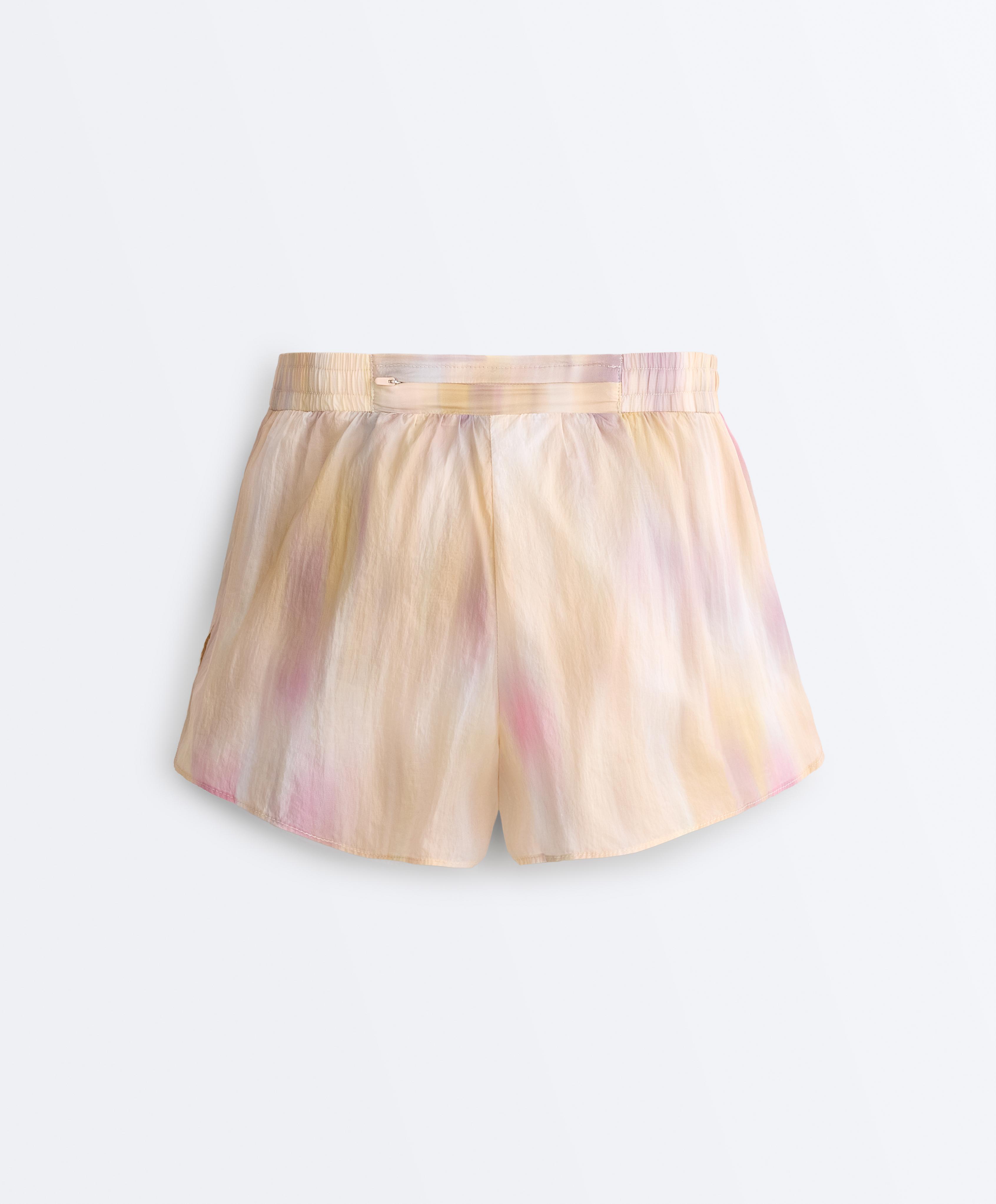2-in-1 tie-dye mid rise technical shorts — VANILLA