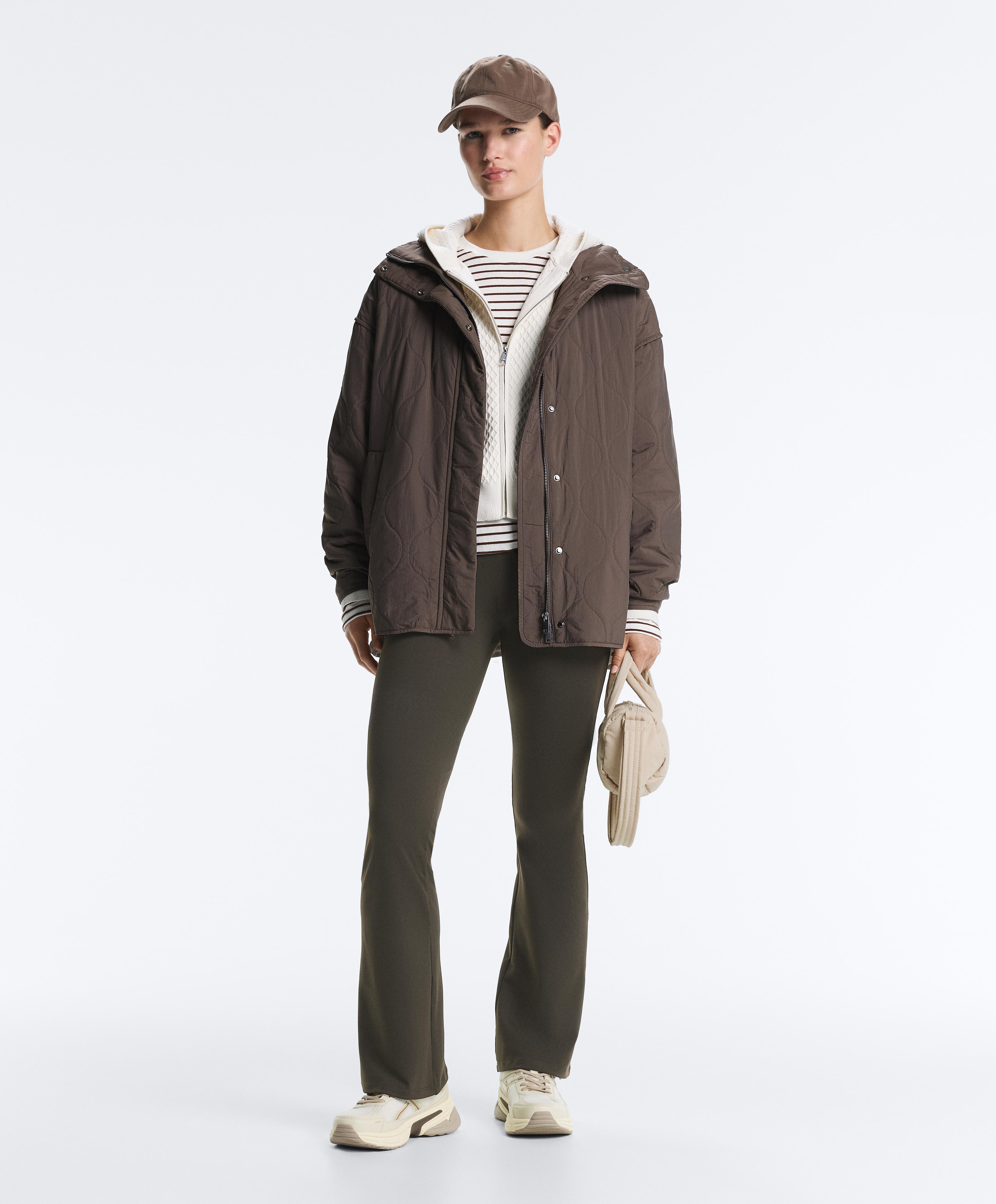 Brown Evermove high rise flare total look