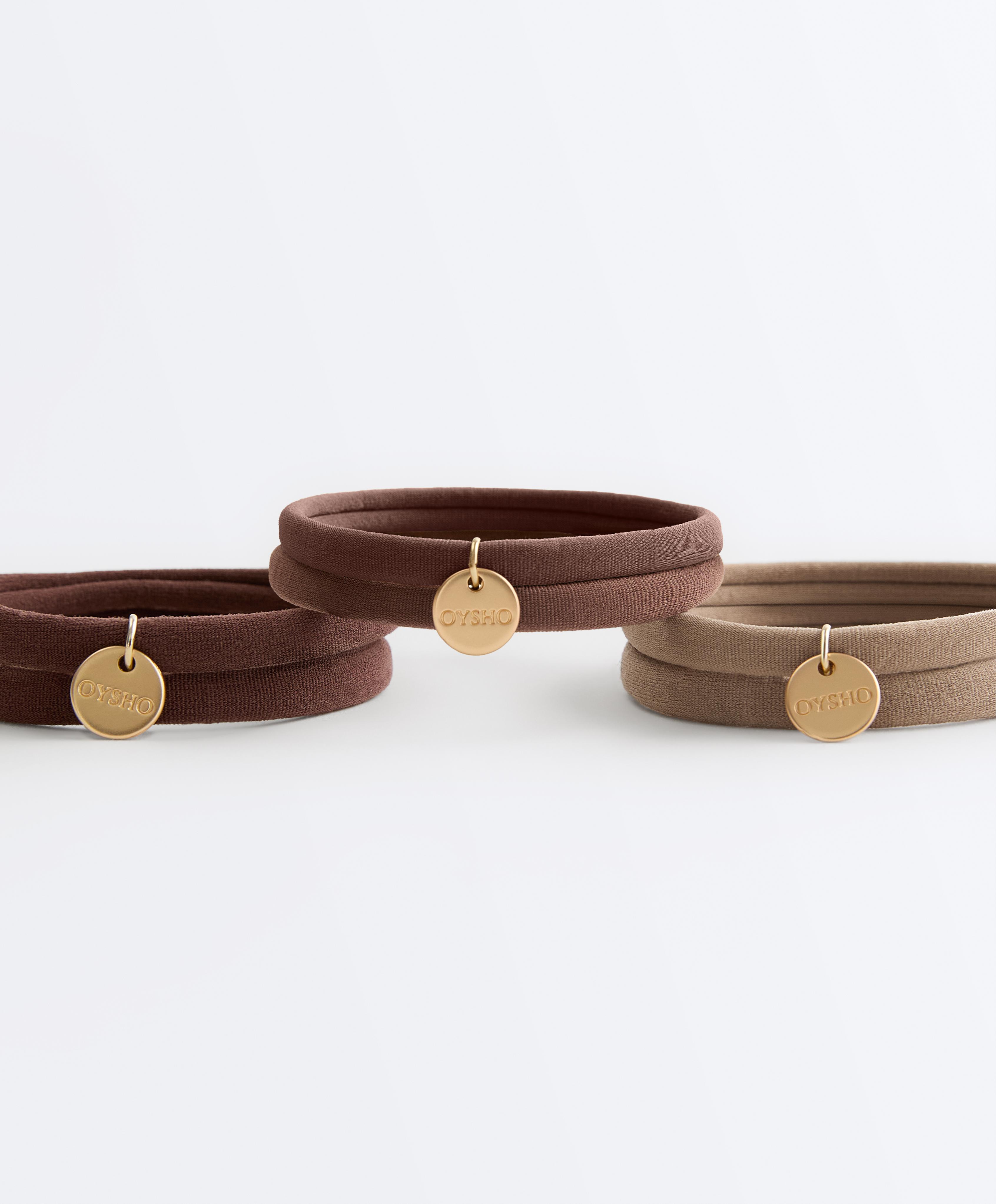 6 Oysho plaque hair ties