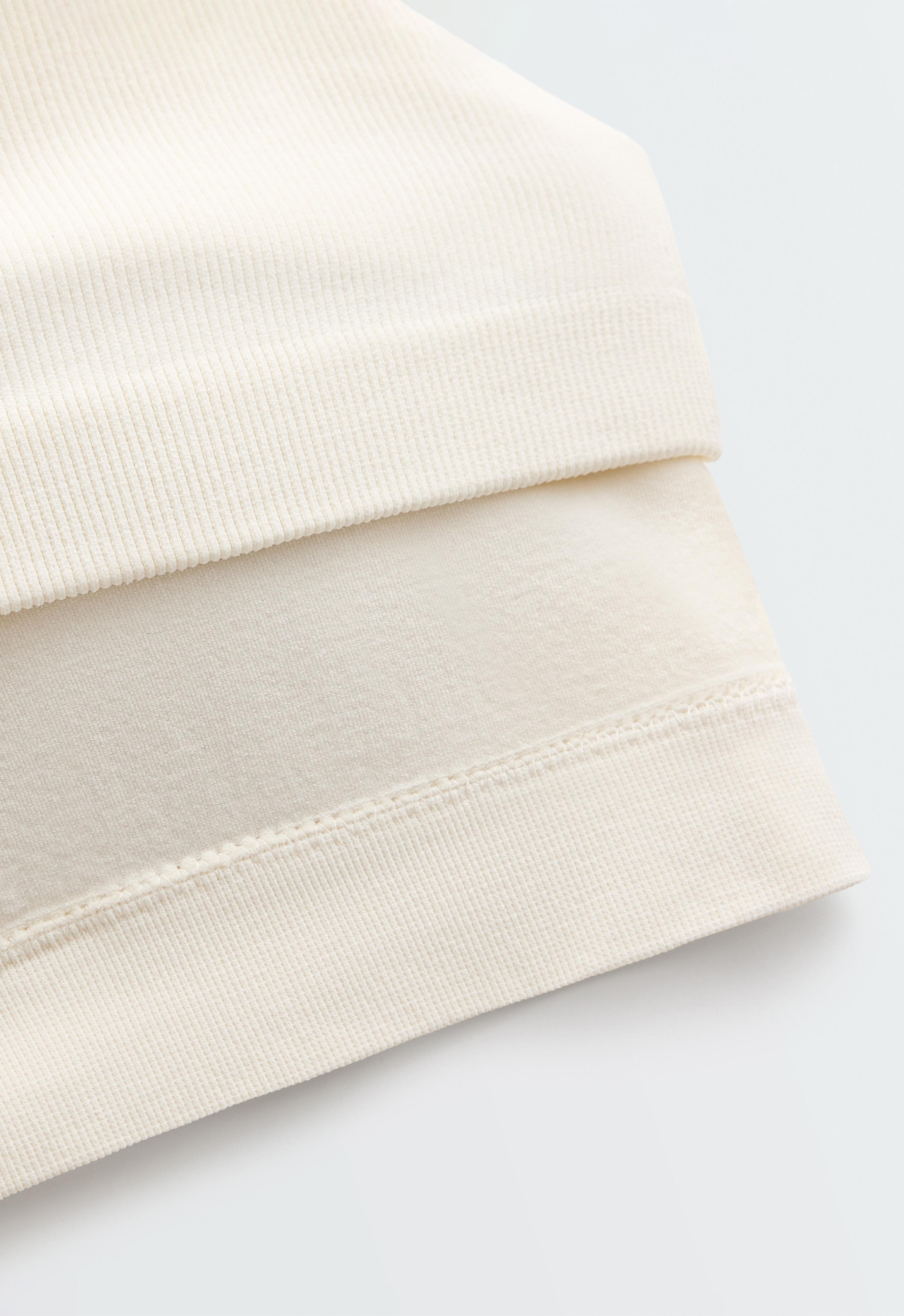 Sleeveless seamless half-zip tank top — PALE ECRU