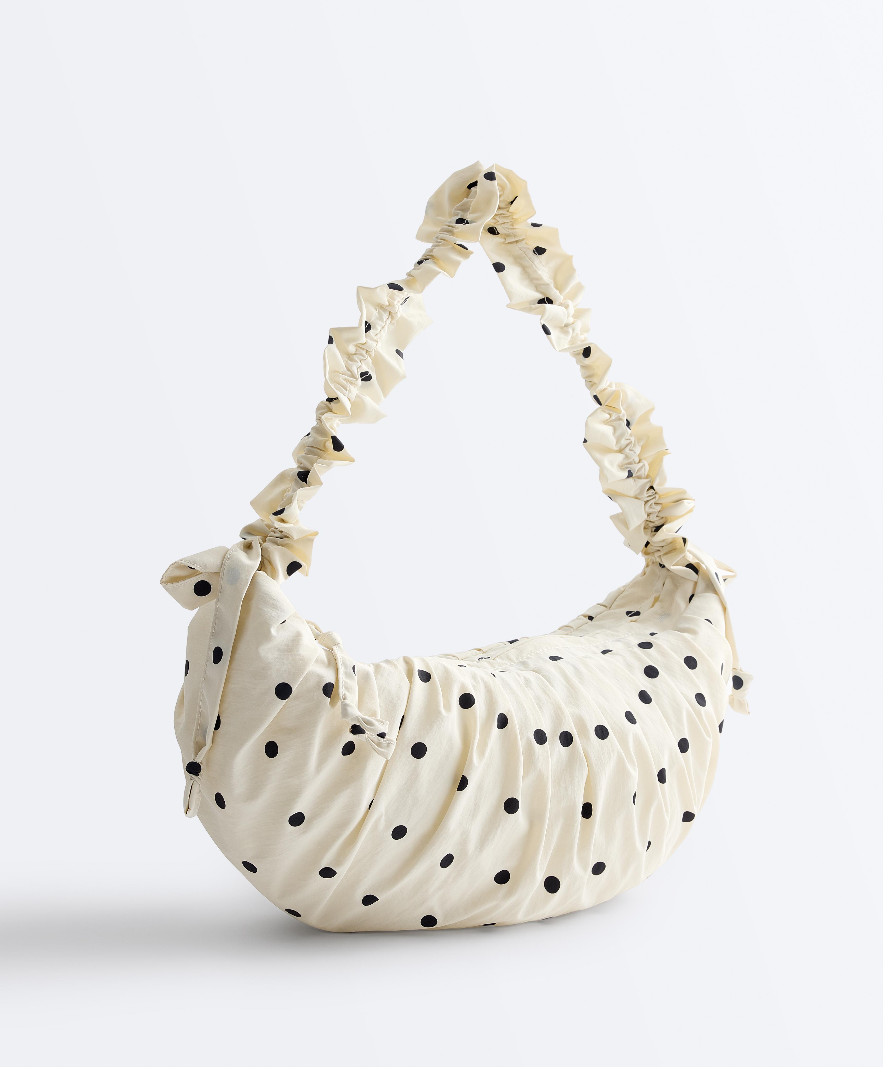 Bolso bandolera estampado topos