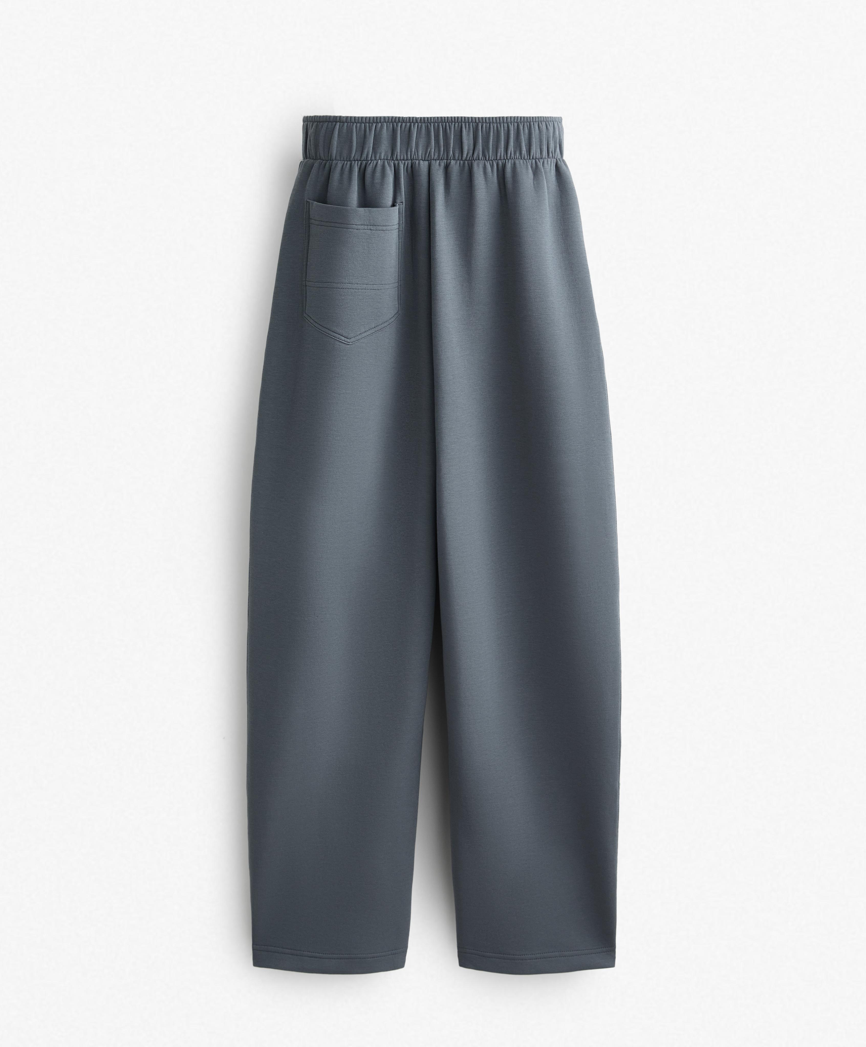 Relaxed cotton blend trousers with front details