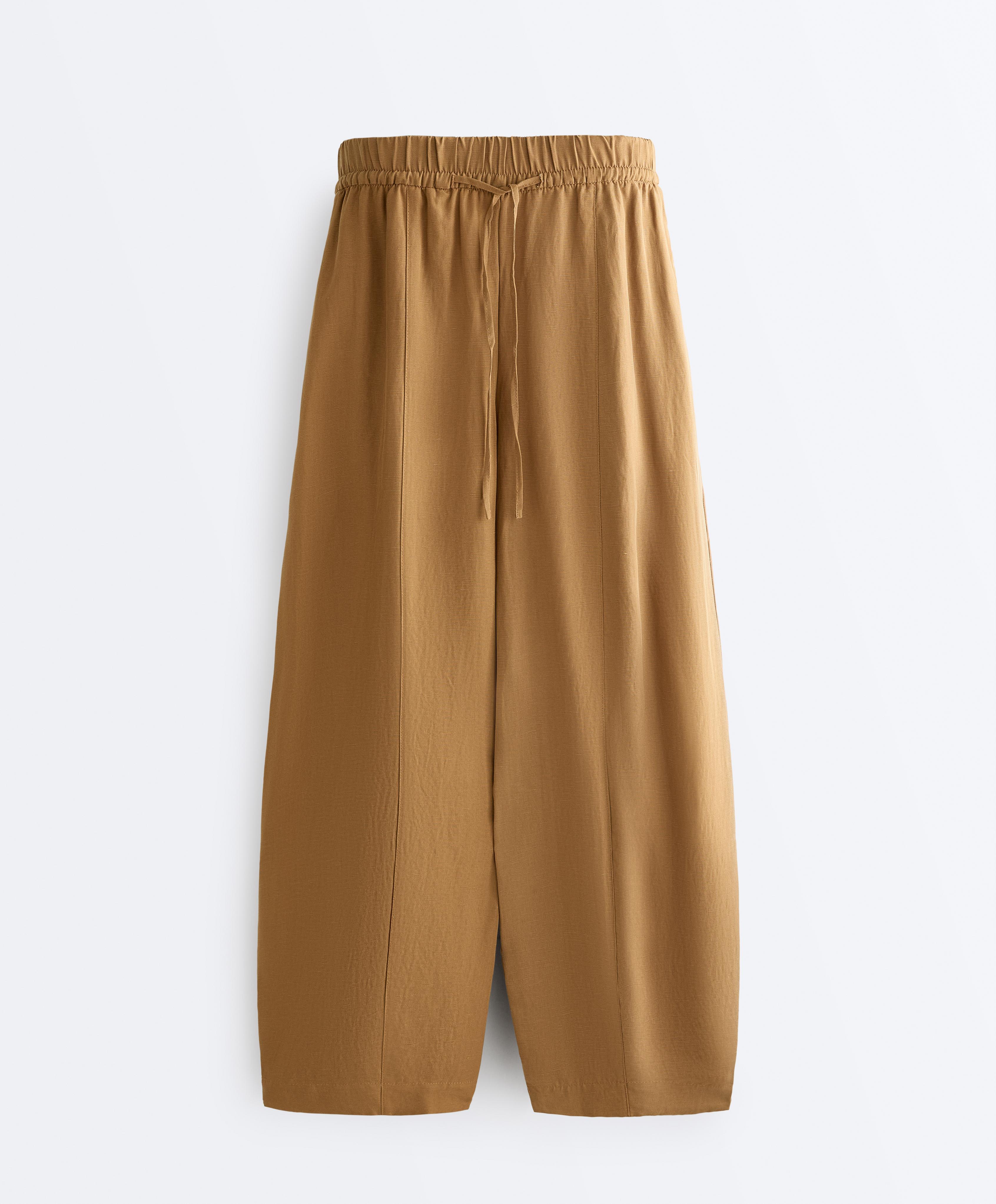 Balloon trousers lyocell blend and 24% linen with seams — COPPER