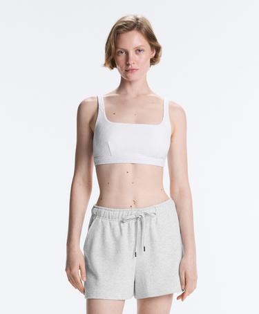 Embroidered medium-support sports bra — WHITE  1