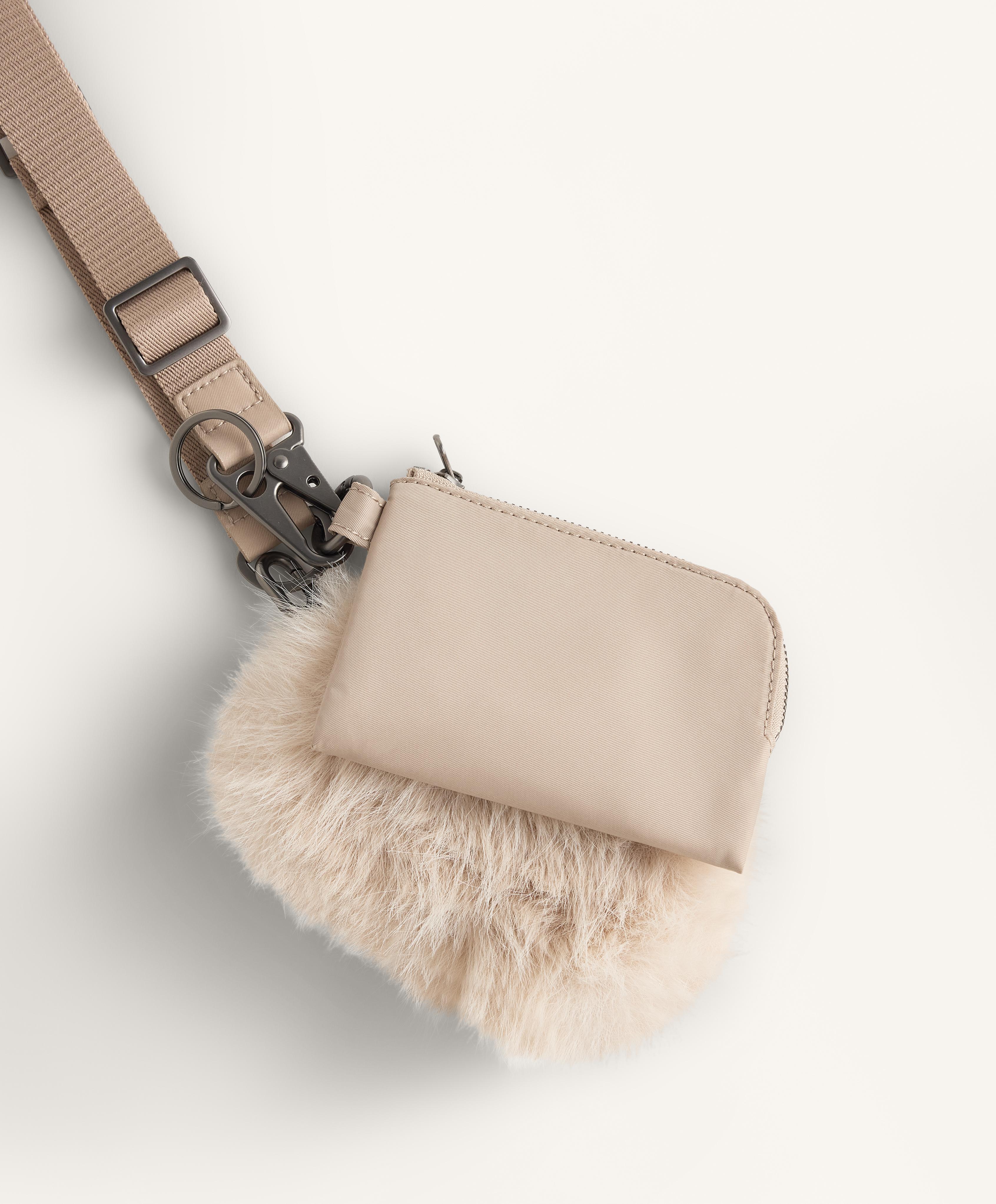 Two wallets with hanging strap