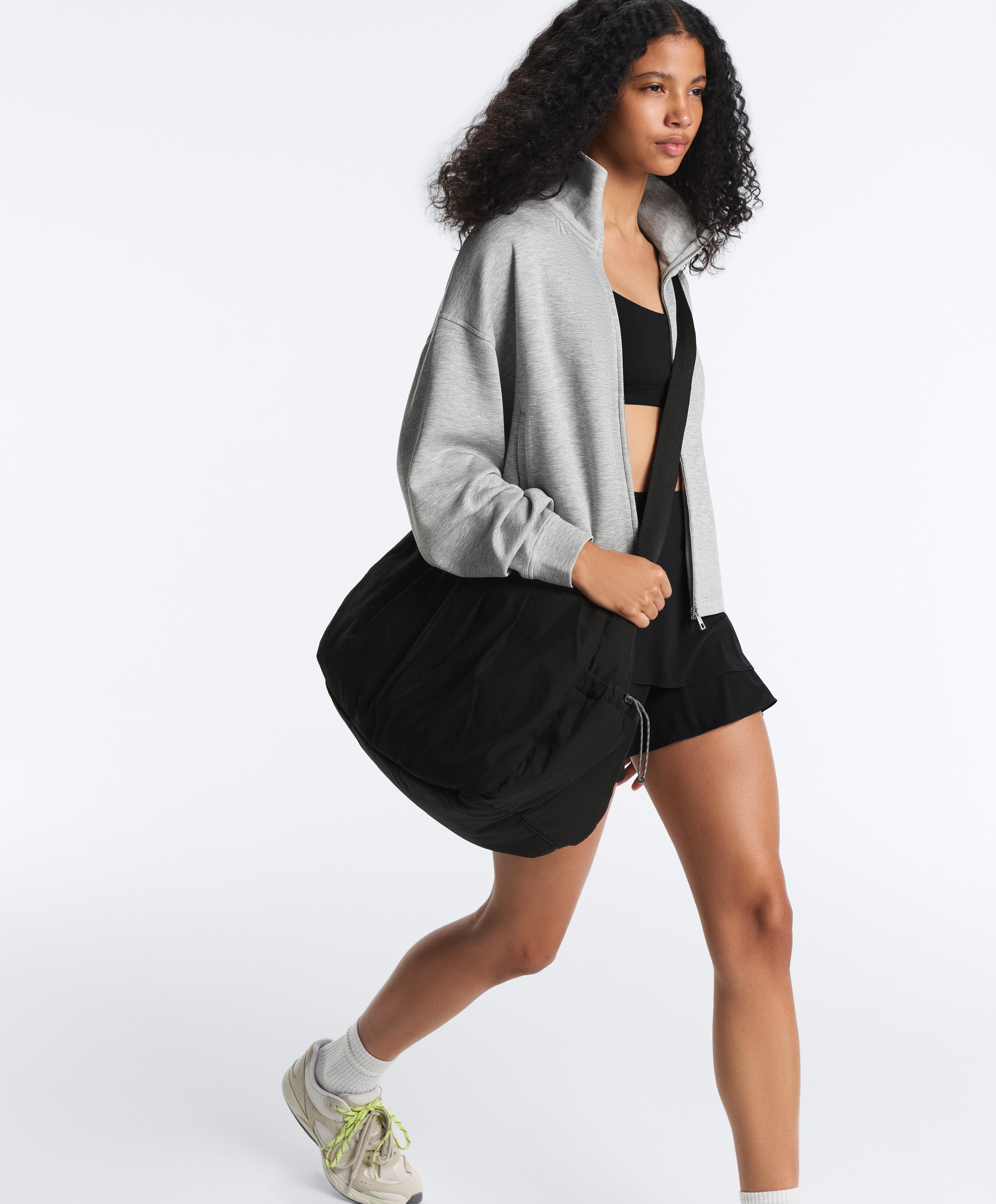 High-rise Compressive frill short skirt — BLACK