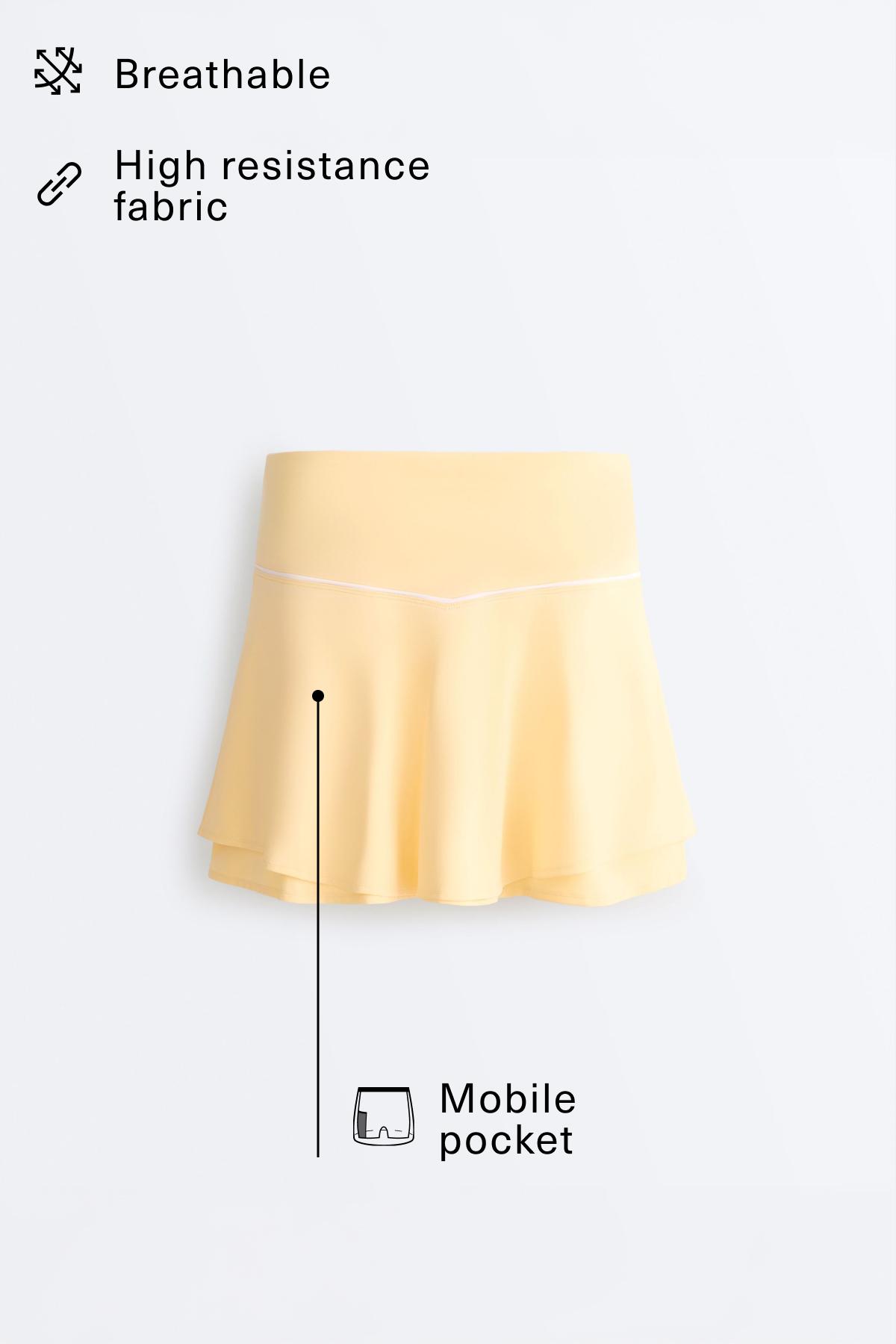 Double layer high rise short skirt — PALE YELLOW