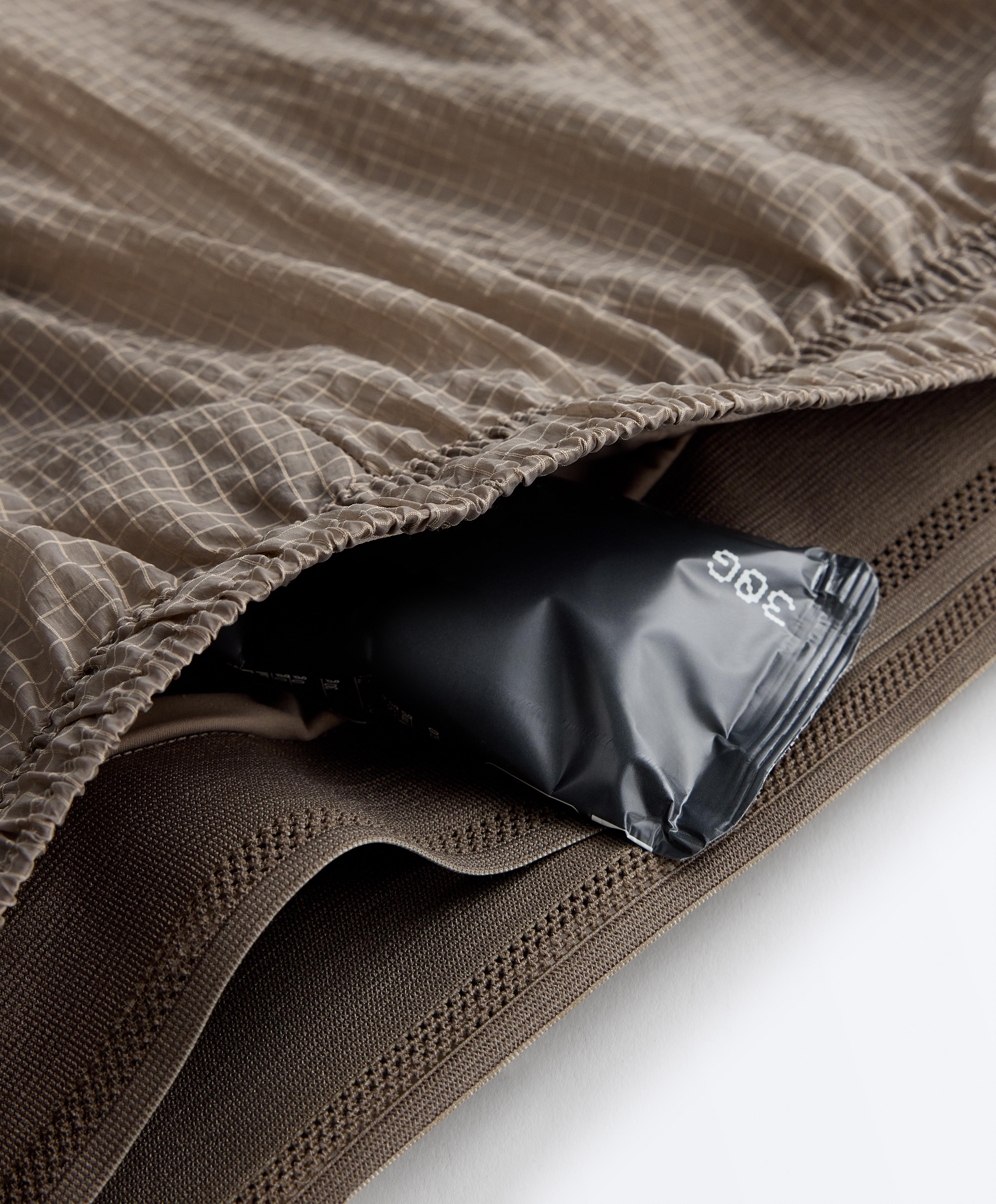 Technical 2-in-1 checked mid-rise shorts — MINK GREY