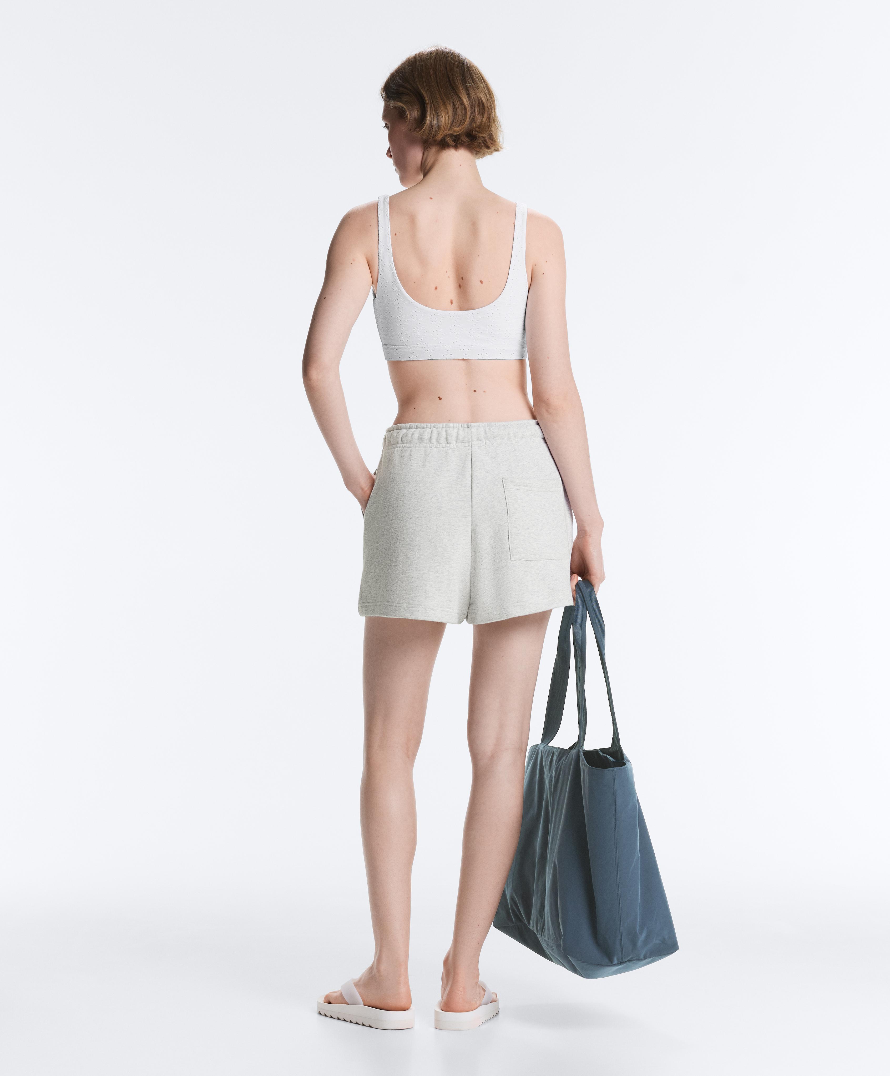 Embroidered medium-support sports bra — WHITE