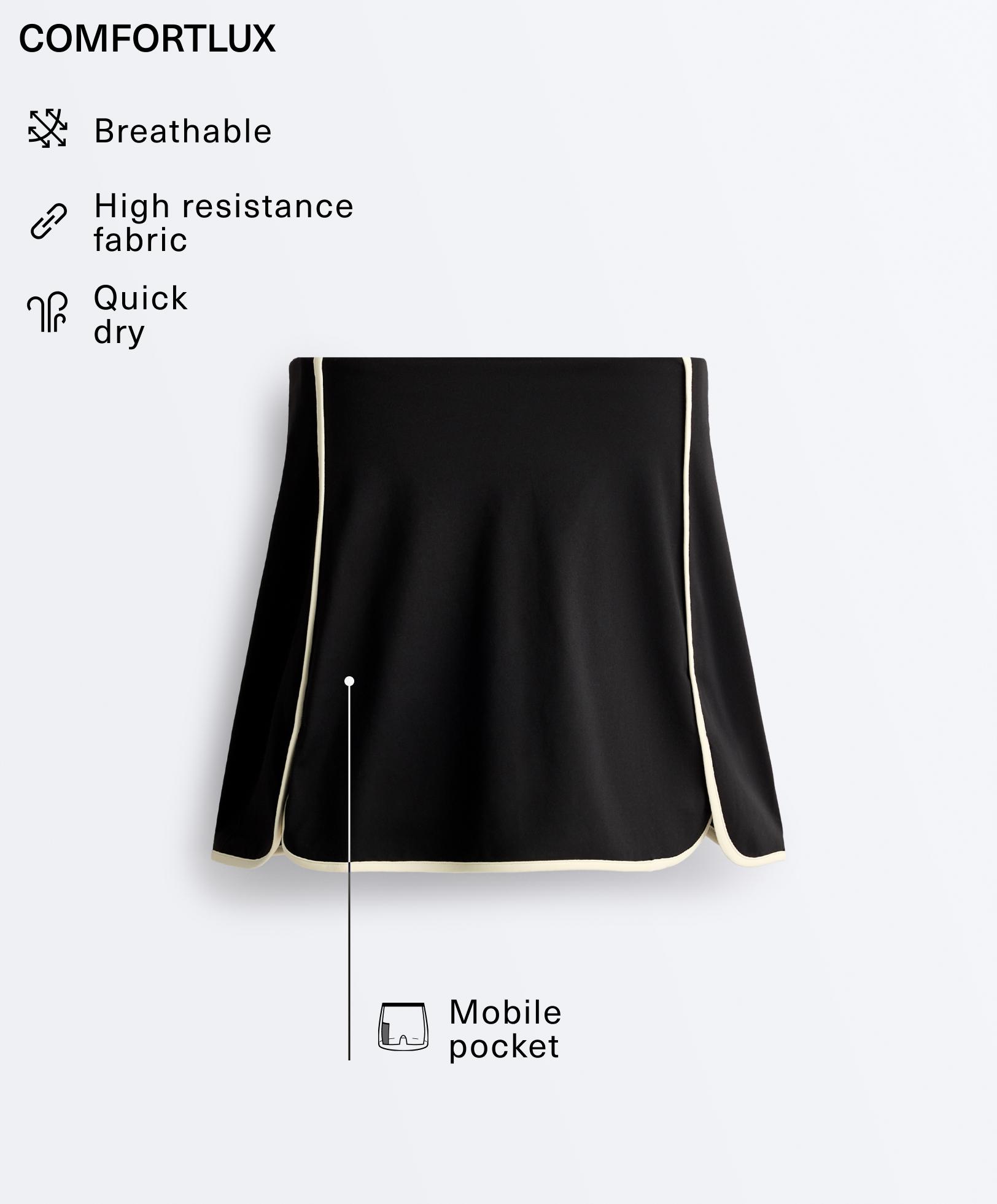 Comfortlux short skirt with contrast piping Comfortlux short skirt with contrast piping