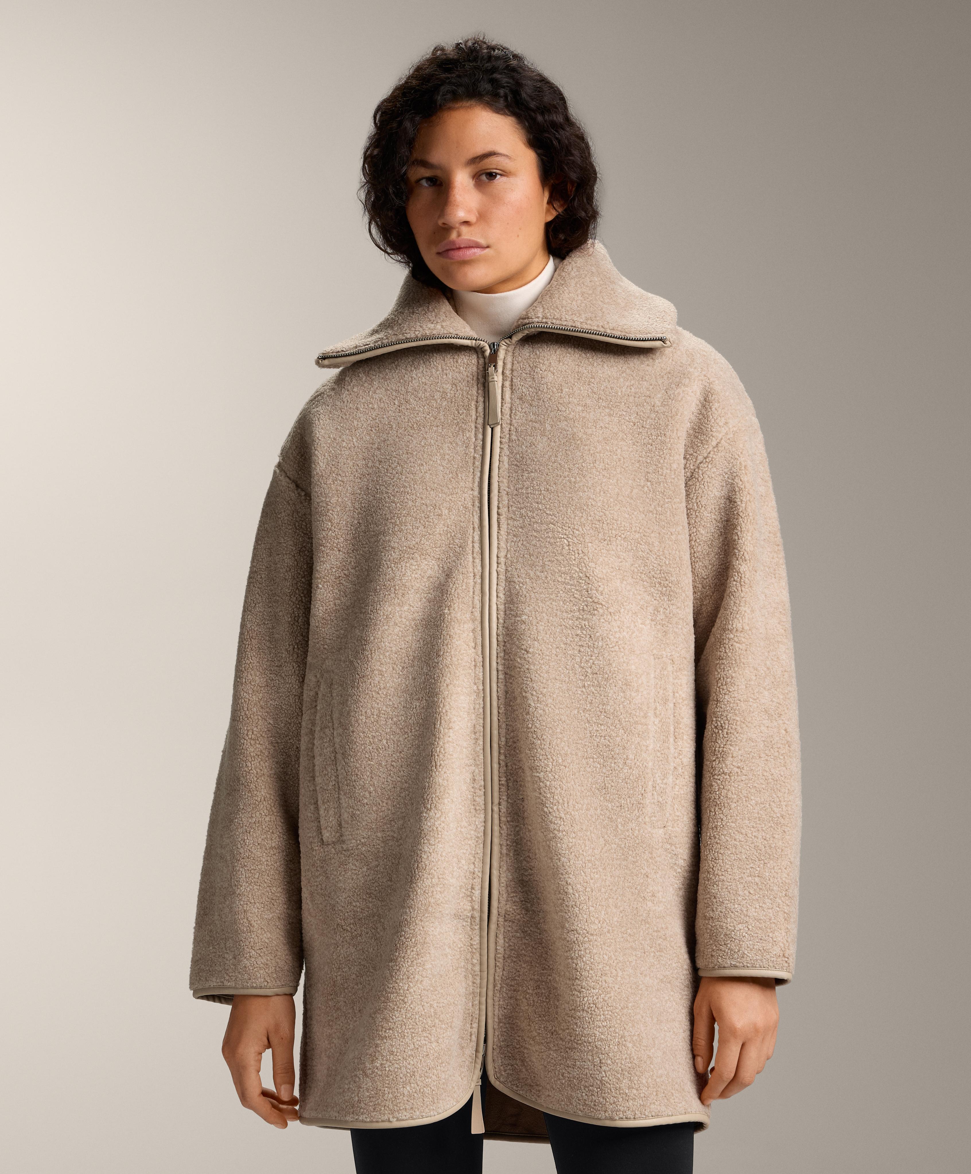 جاكيت طويل من فرو الغنم الاصطناعي جاكيت طويل من فرو الغنم الاصطناعي