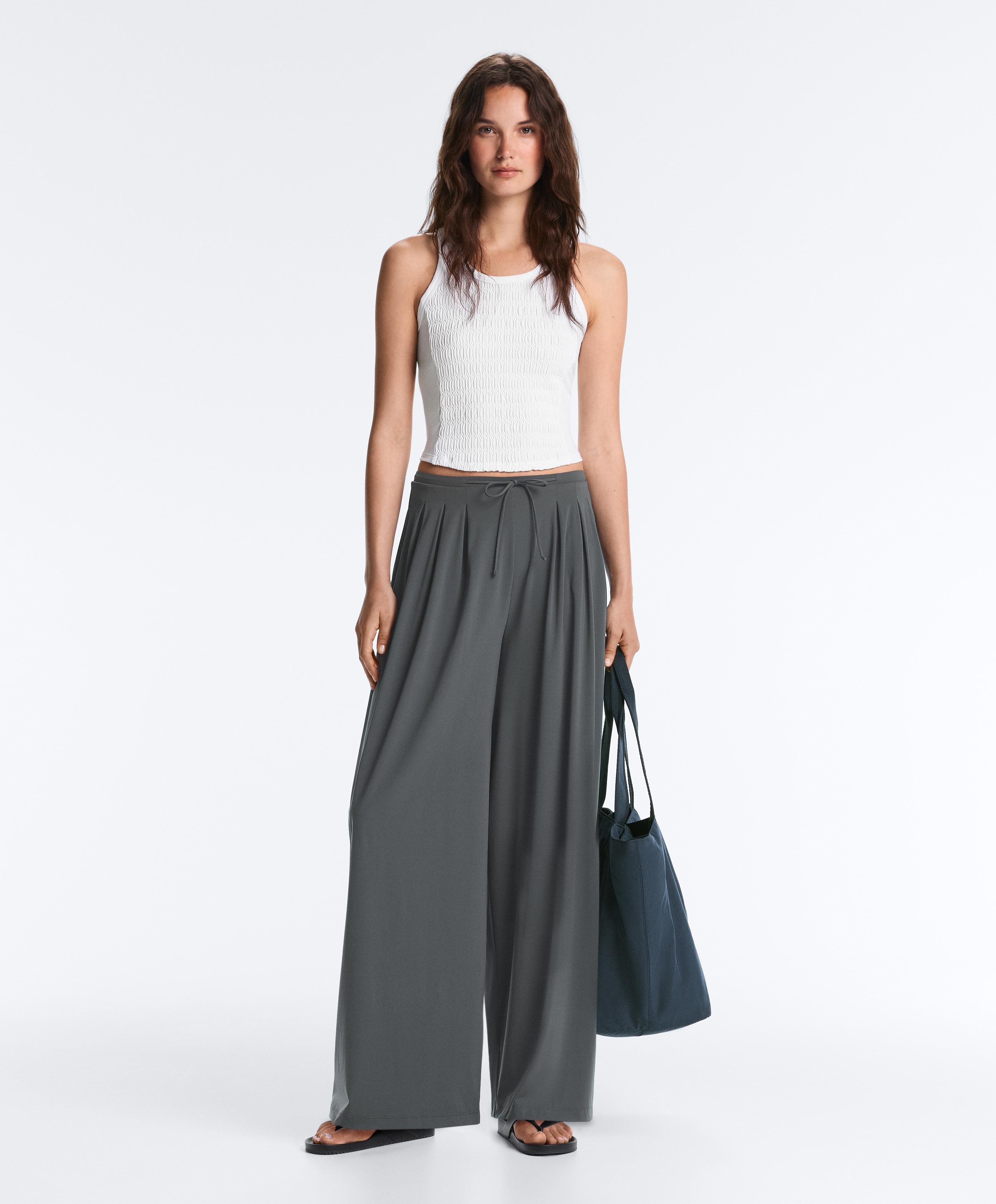 Maglietta seamless senza maniche smock