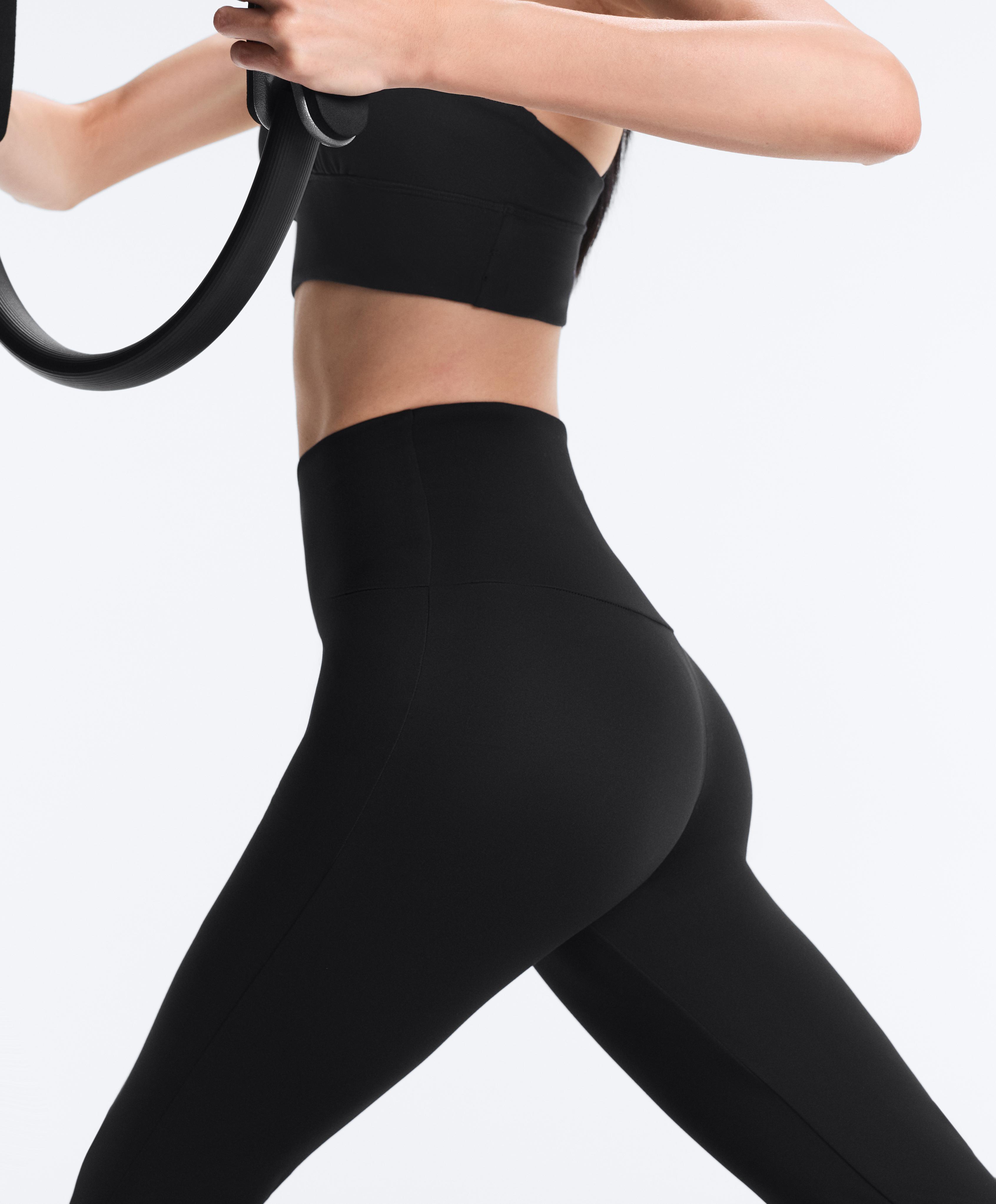 High-rise Comfortlux flare trousers — BLACK
