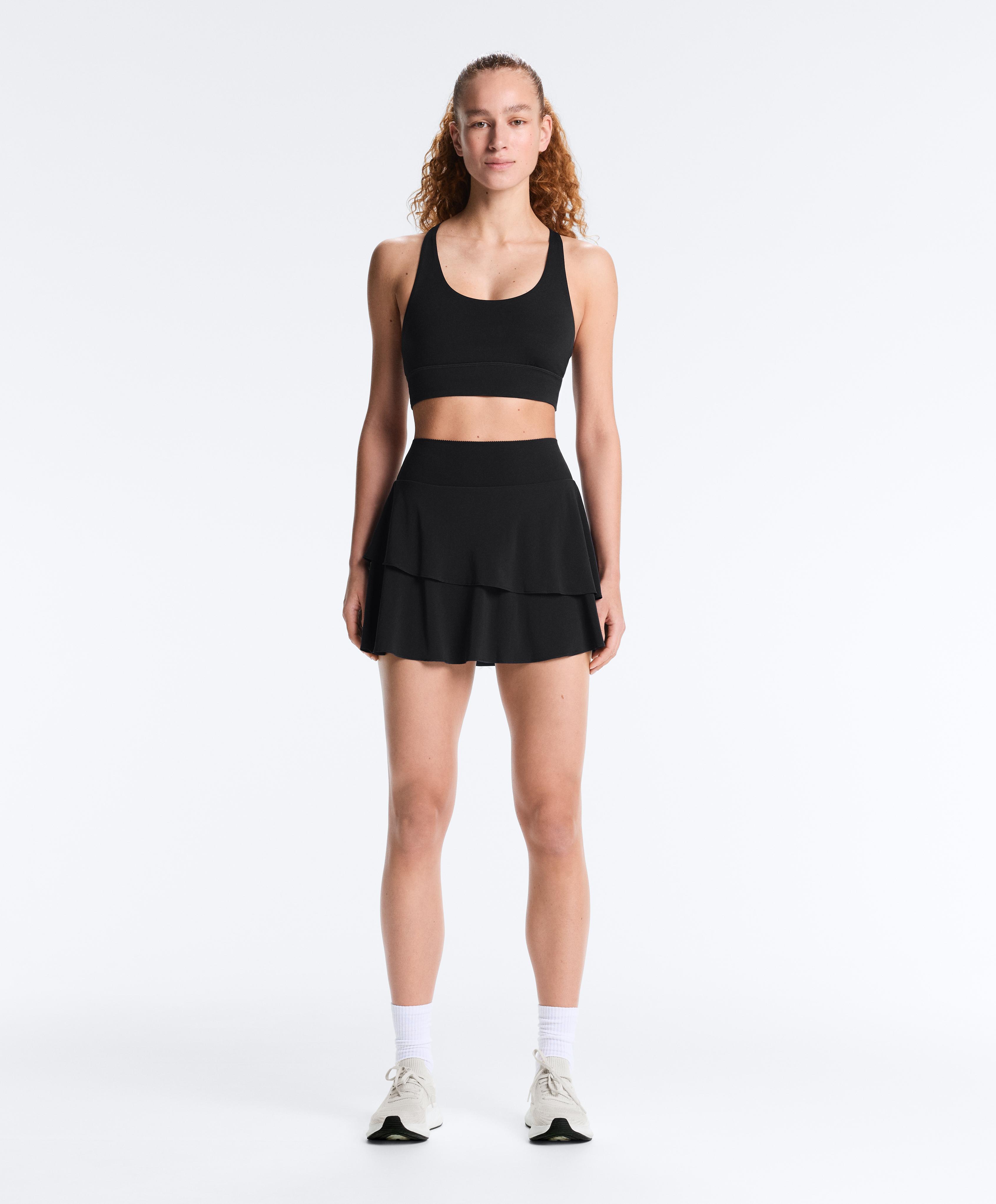 High-rise Compressive frill short skirt — BLACK