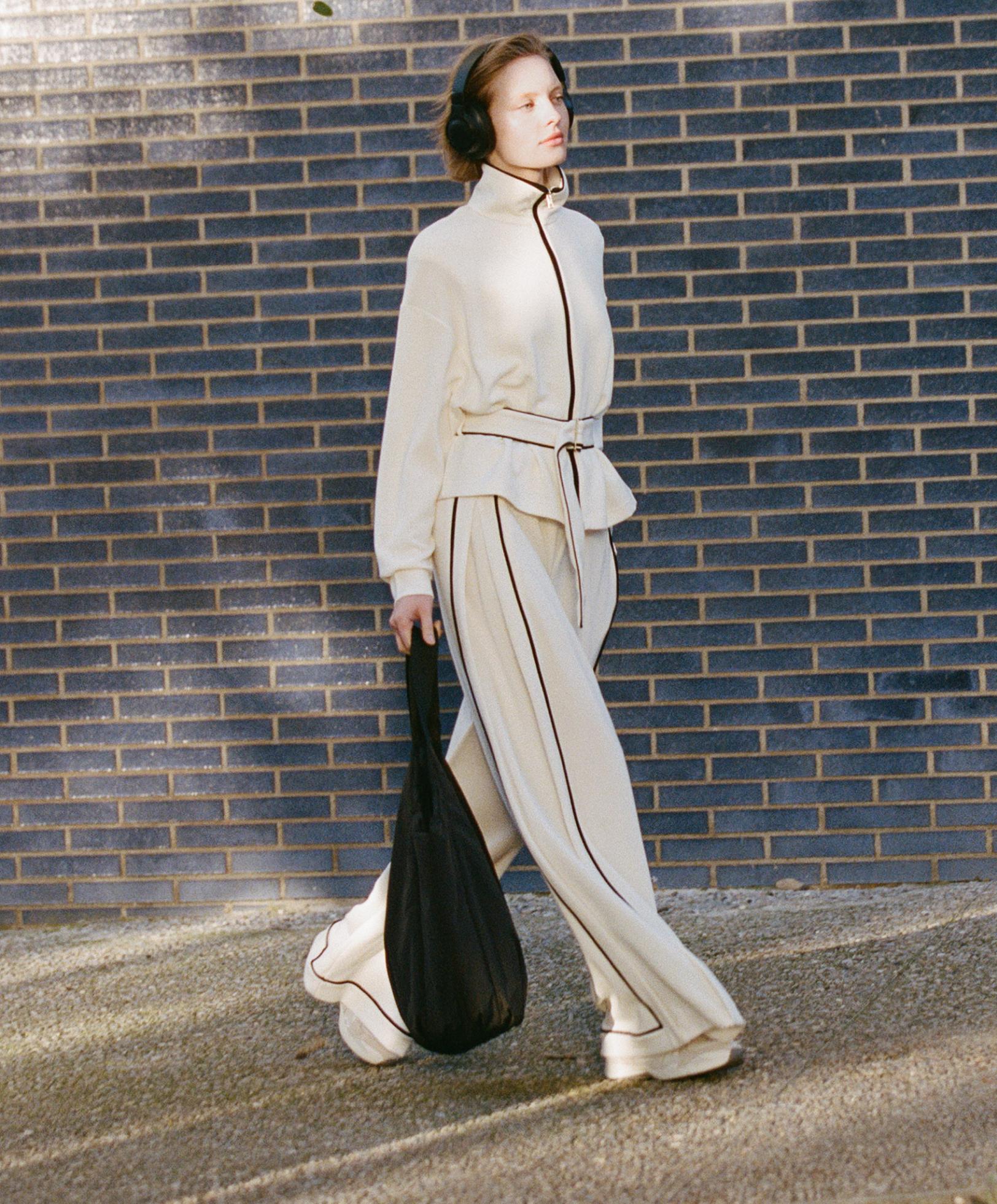 Soft-touch modal wide-leg trousers with contrast piping — PALE ECRU