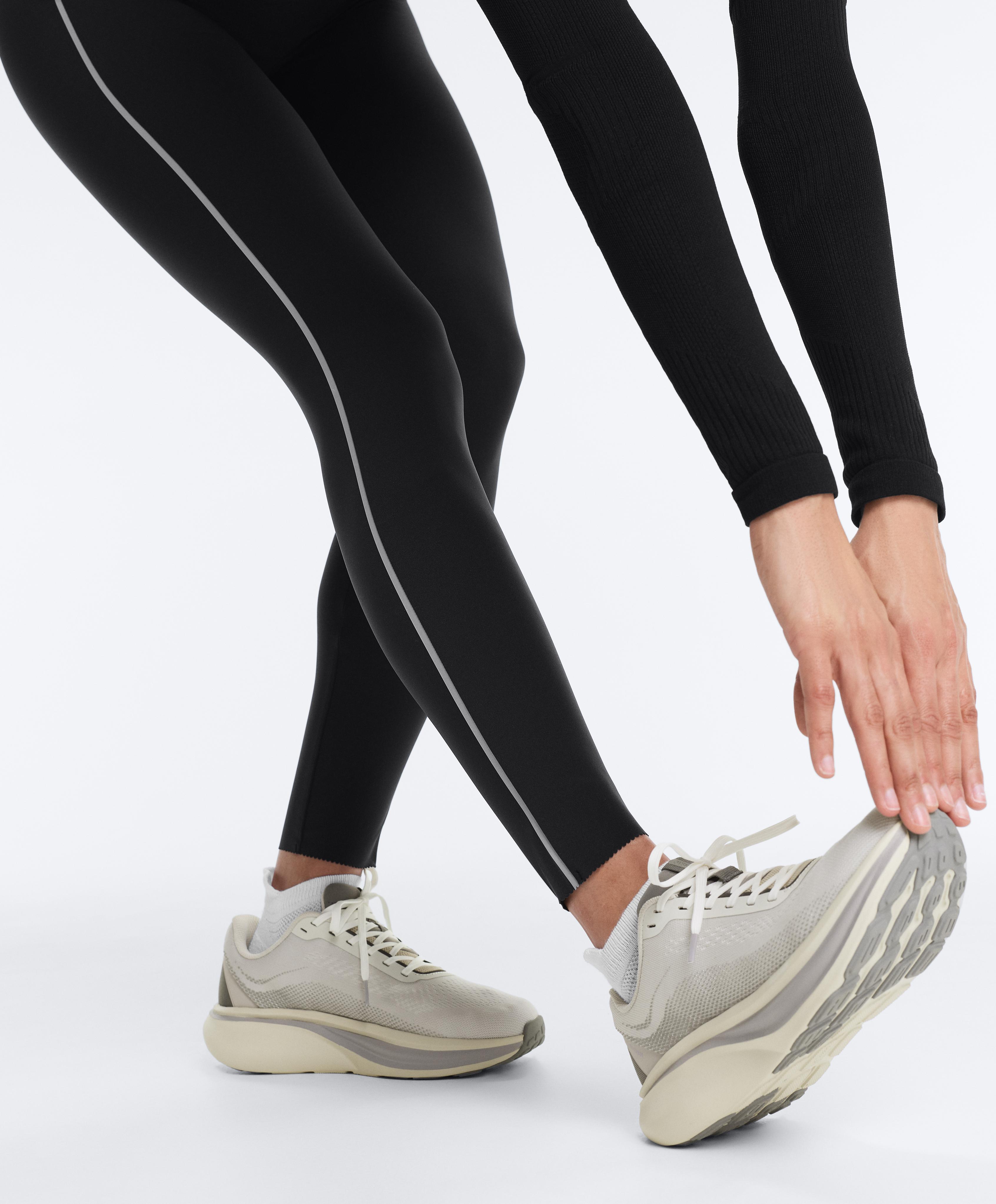 Reflective high-rise Compressive core control ankle-length leggings — BLACK
