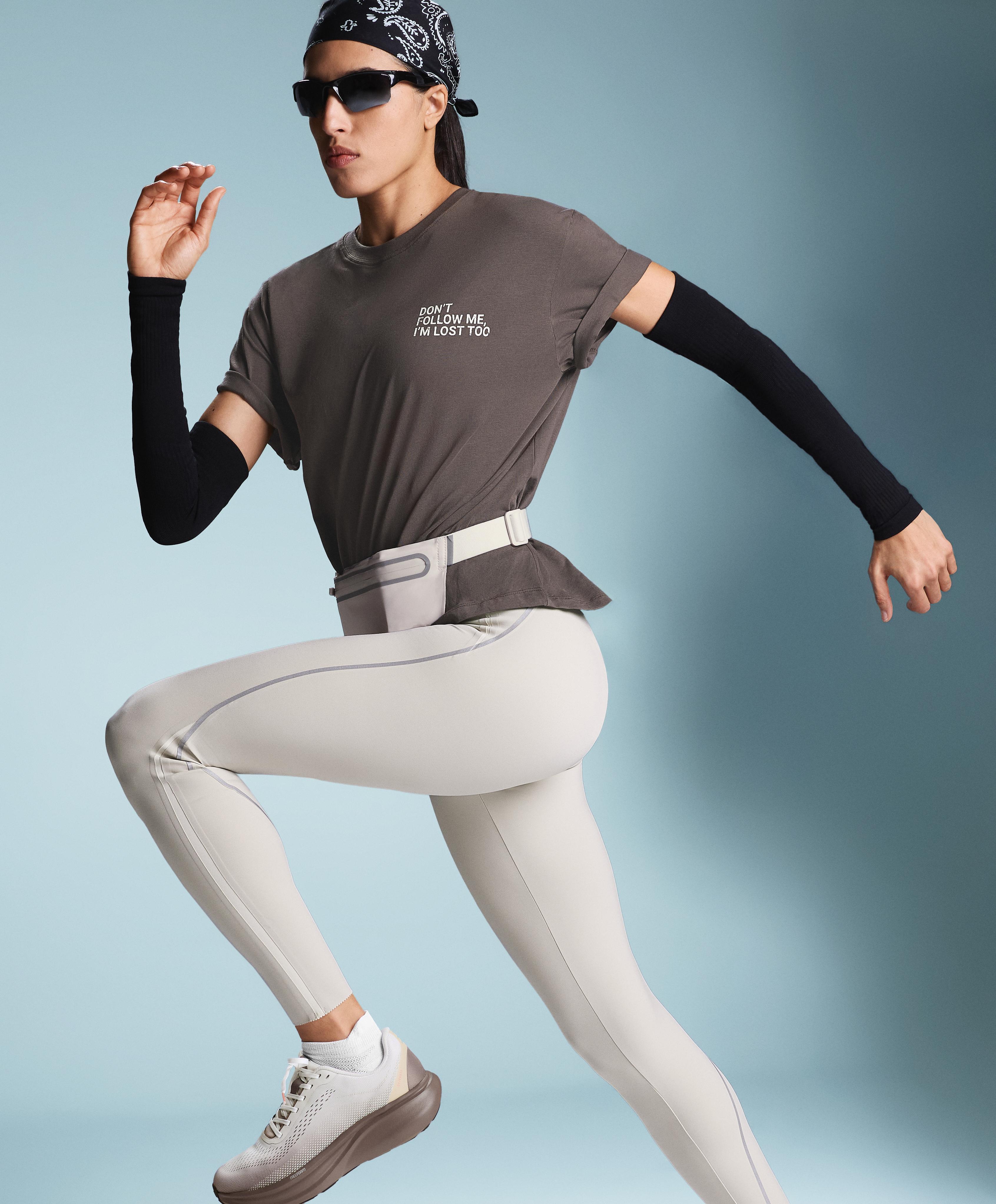 High-rise Compressive reflective core control ankle-length leggings — TAUPE