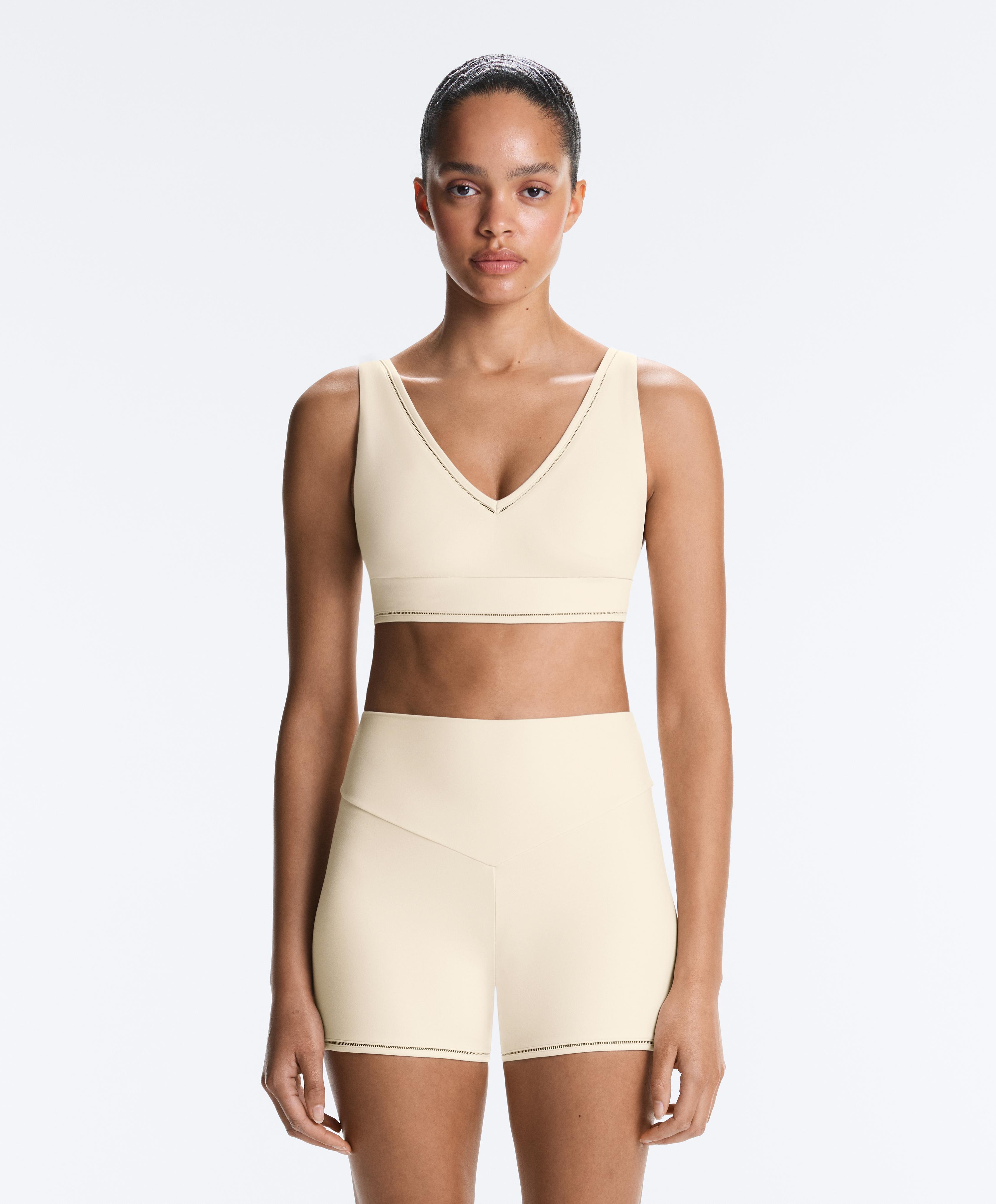 Comfortlux medium-support hemstitch sports bra — ECRU