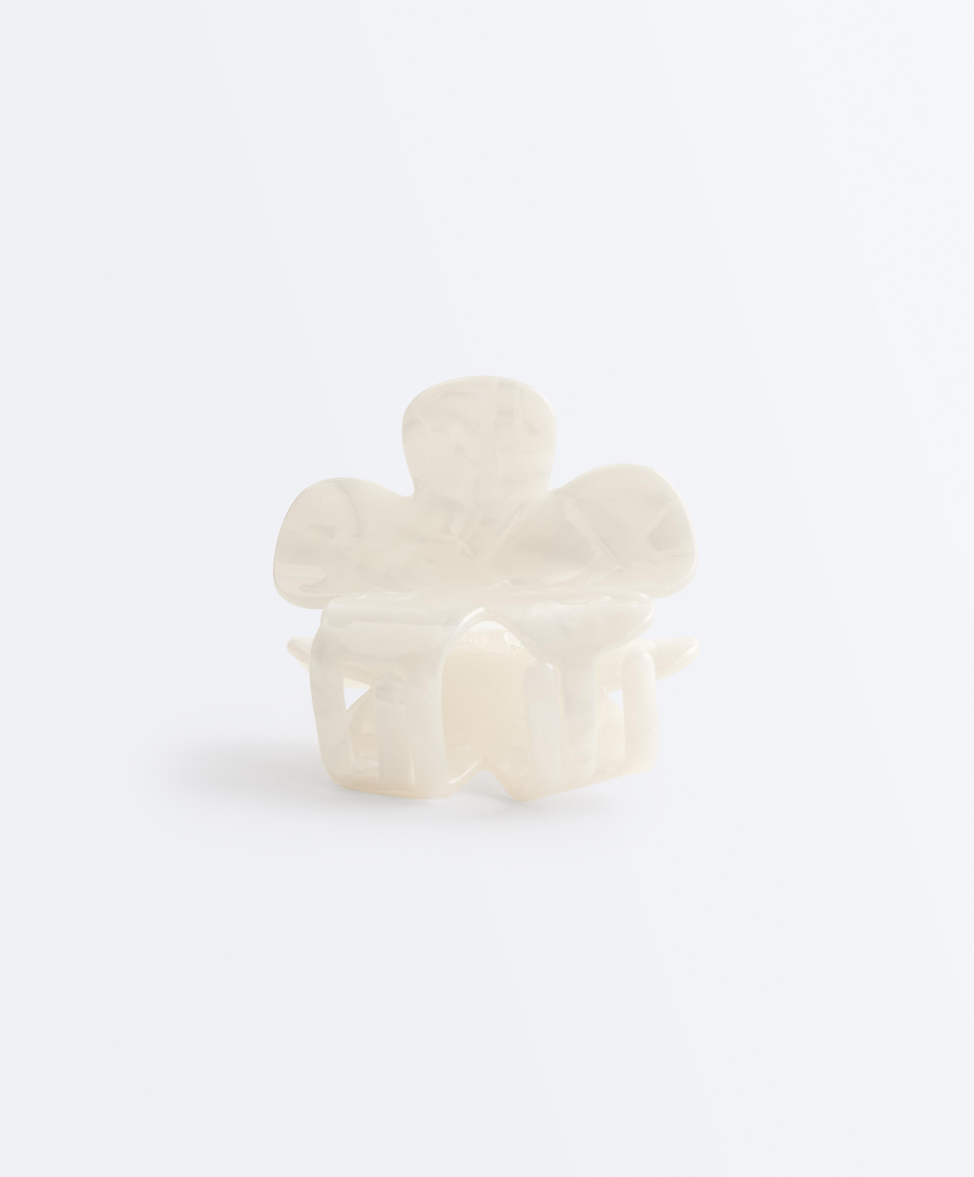 Petite pince à cheveux fleur effet léopard Petite pince à cheveux fleur effet léopard