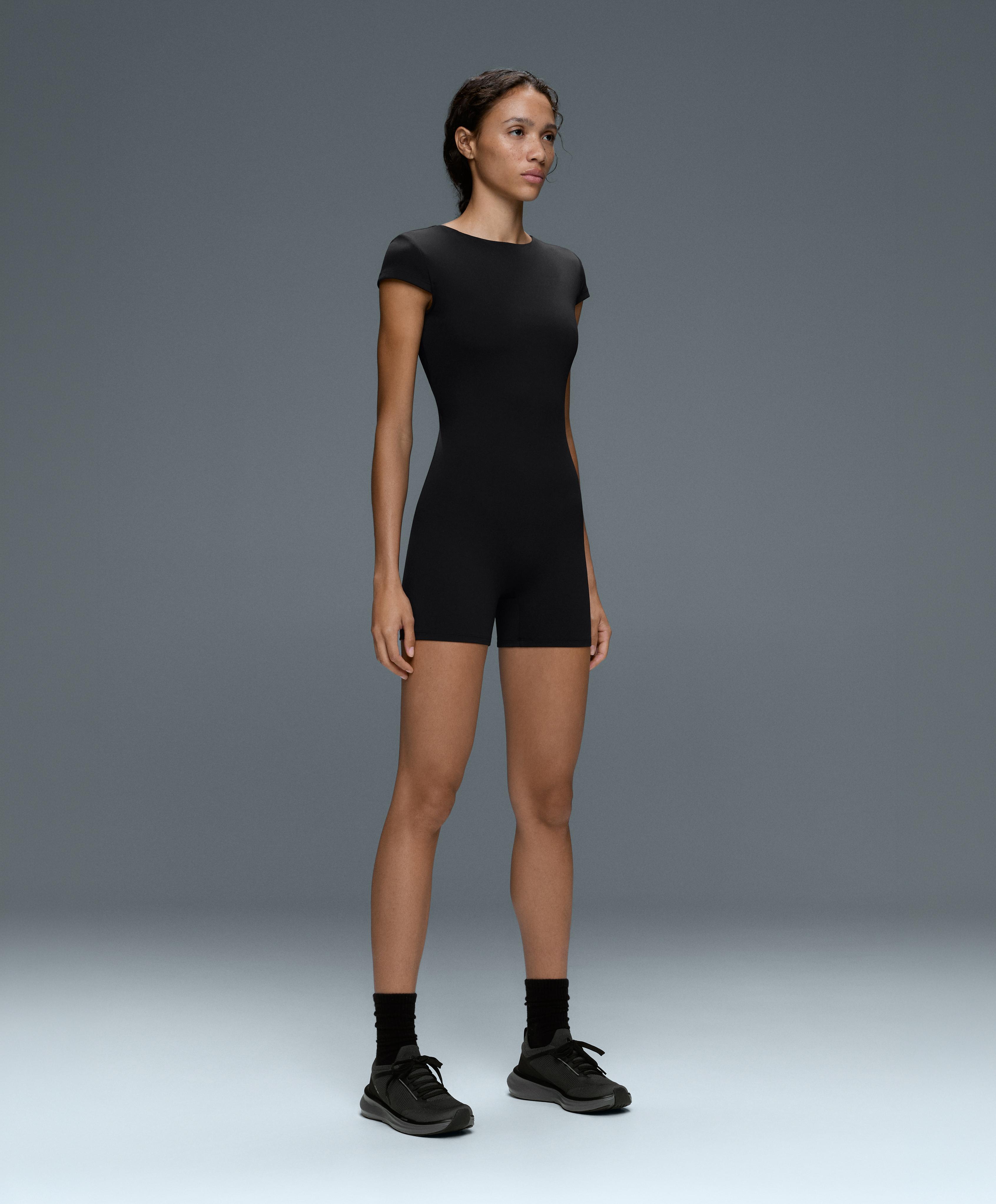 Comfortlux open-back short jumpsuit — BLACK
