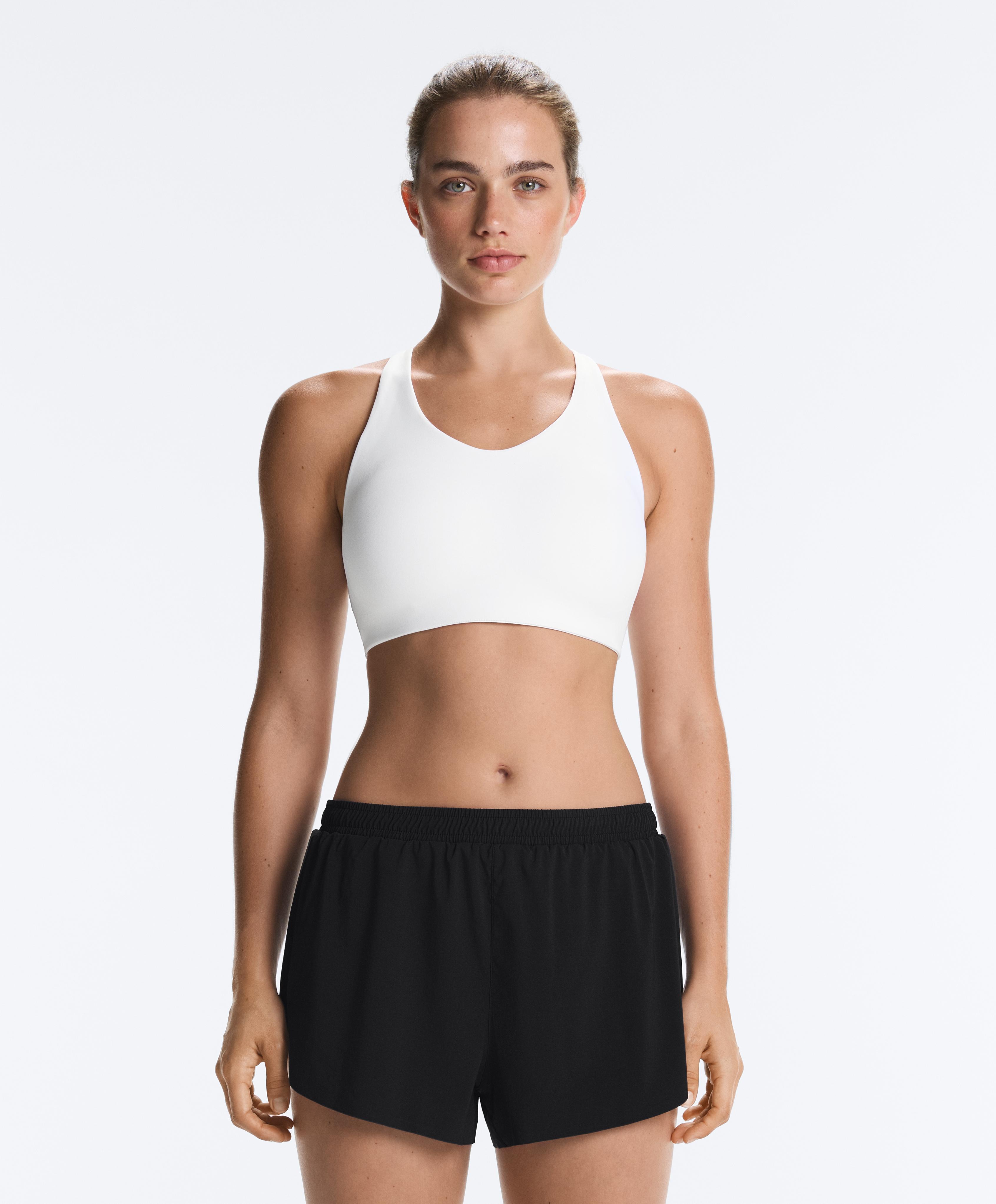 High-support Compressive sports bra with crossover back — WHITE