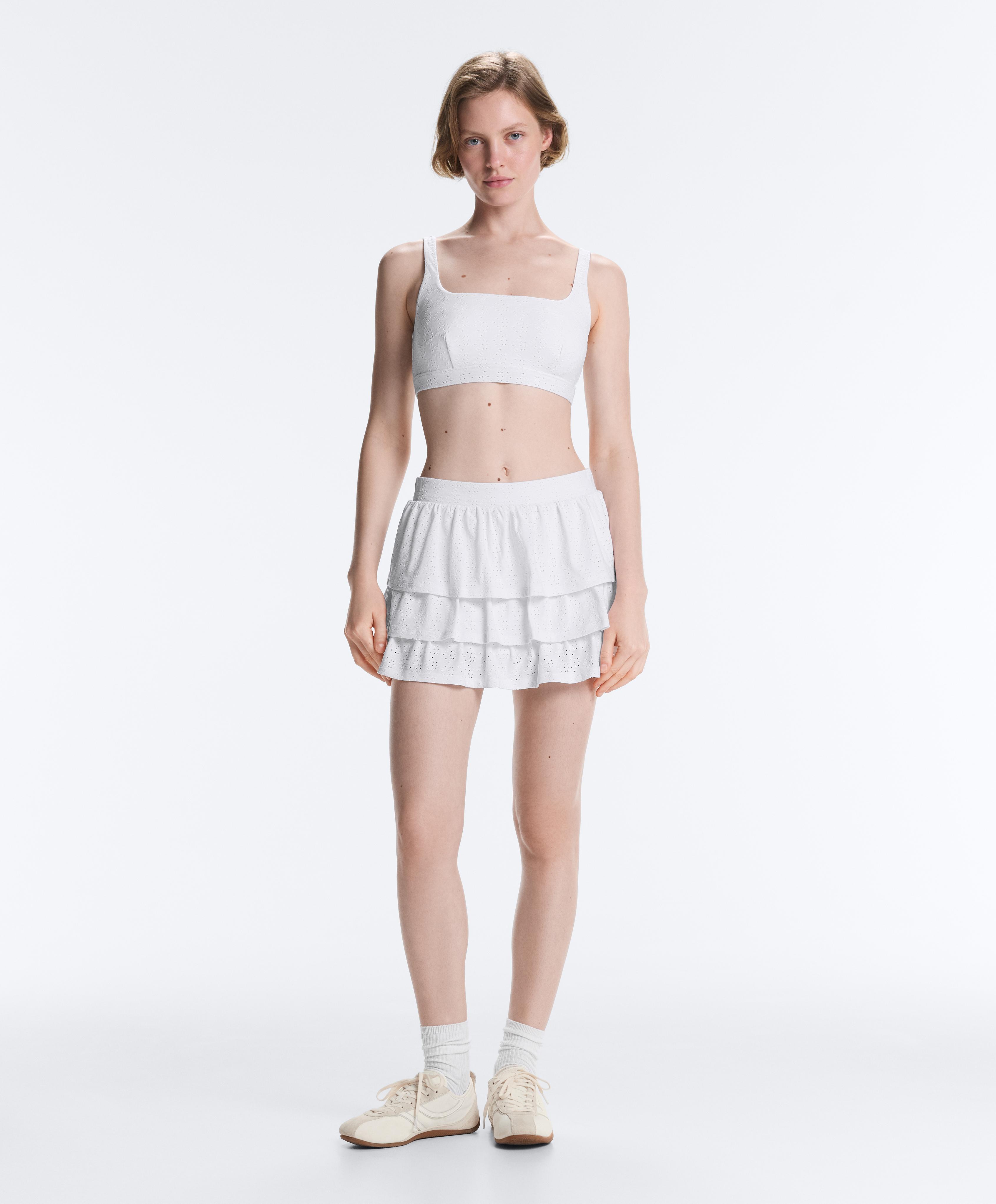Embroidered medium-support sports bra — WHITE