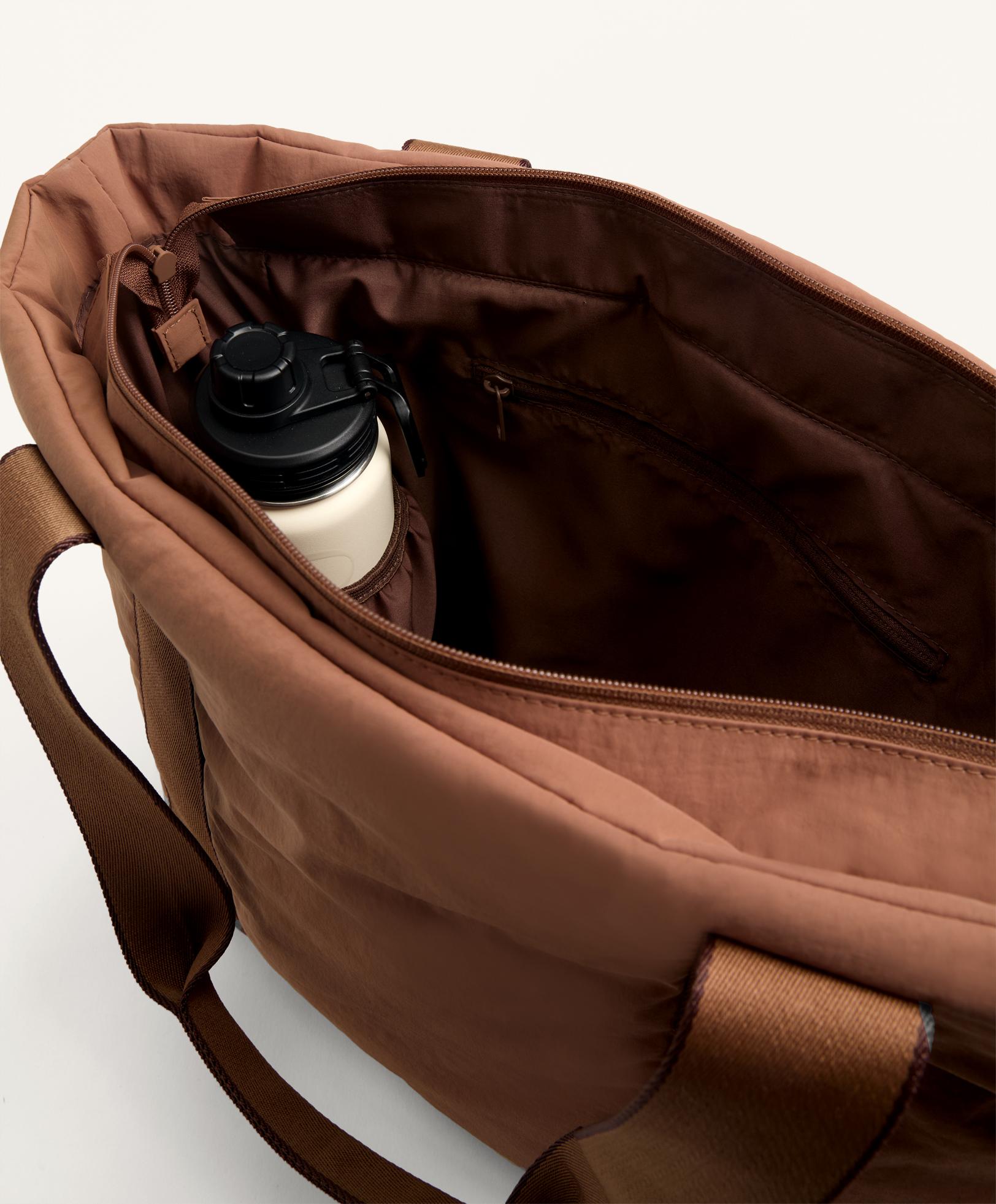 حقيبة تسوق بجيوب أمامية - تنزيلات