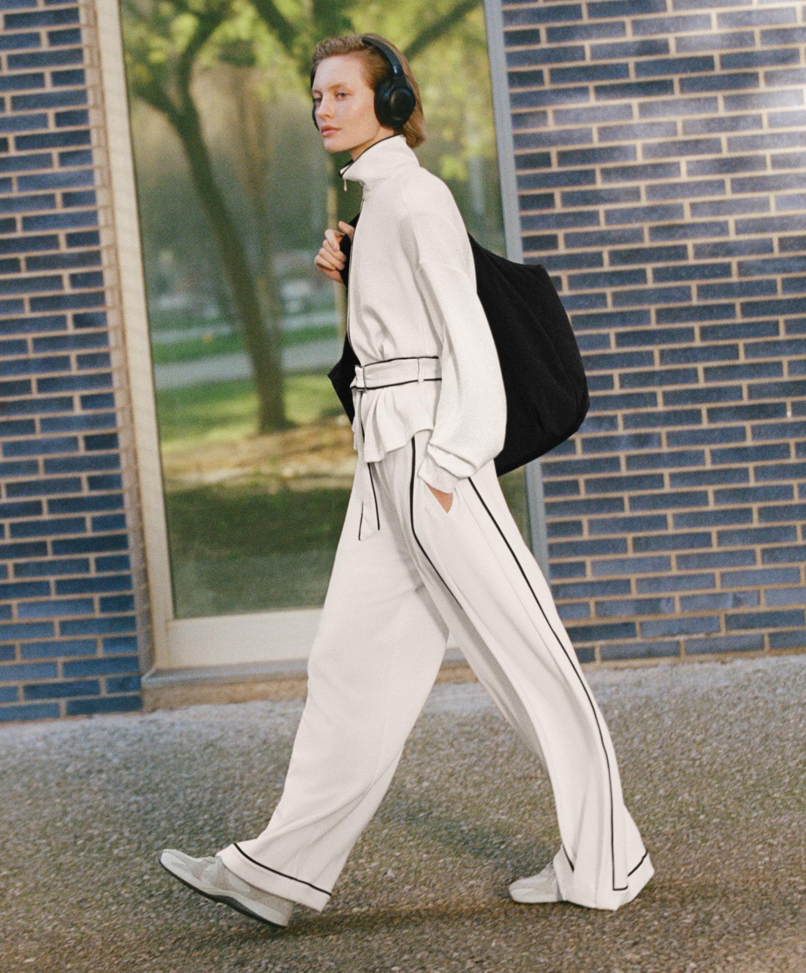 Soft-touch modal wide-leg trousers with contrast piping — PALE ECRU