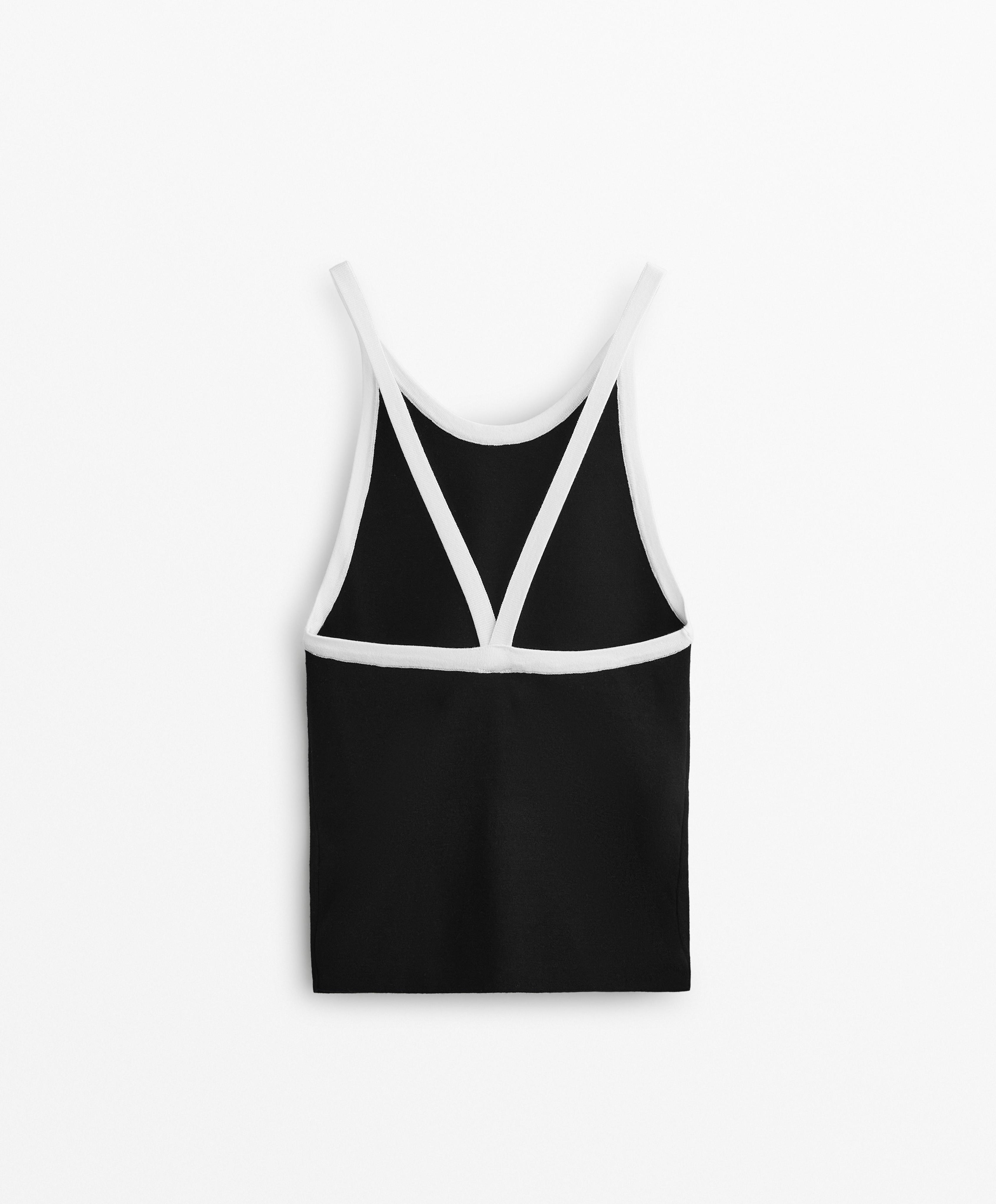 Knit vest top. Crossover back.