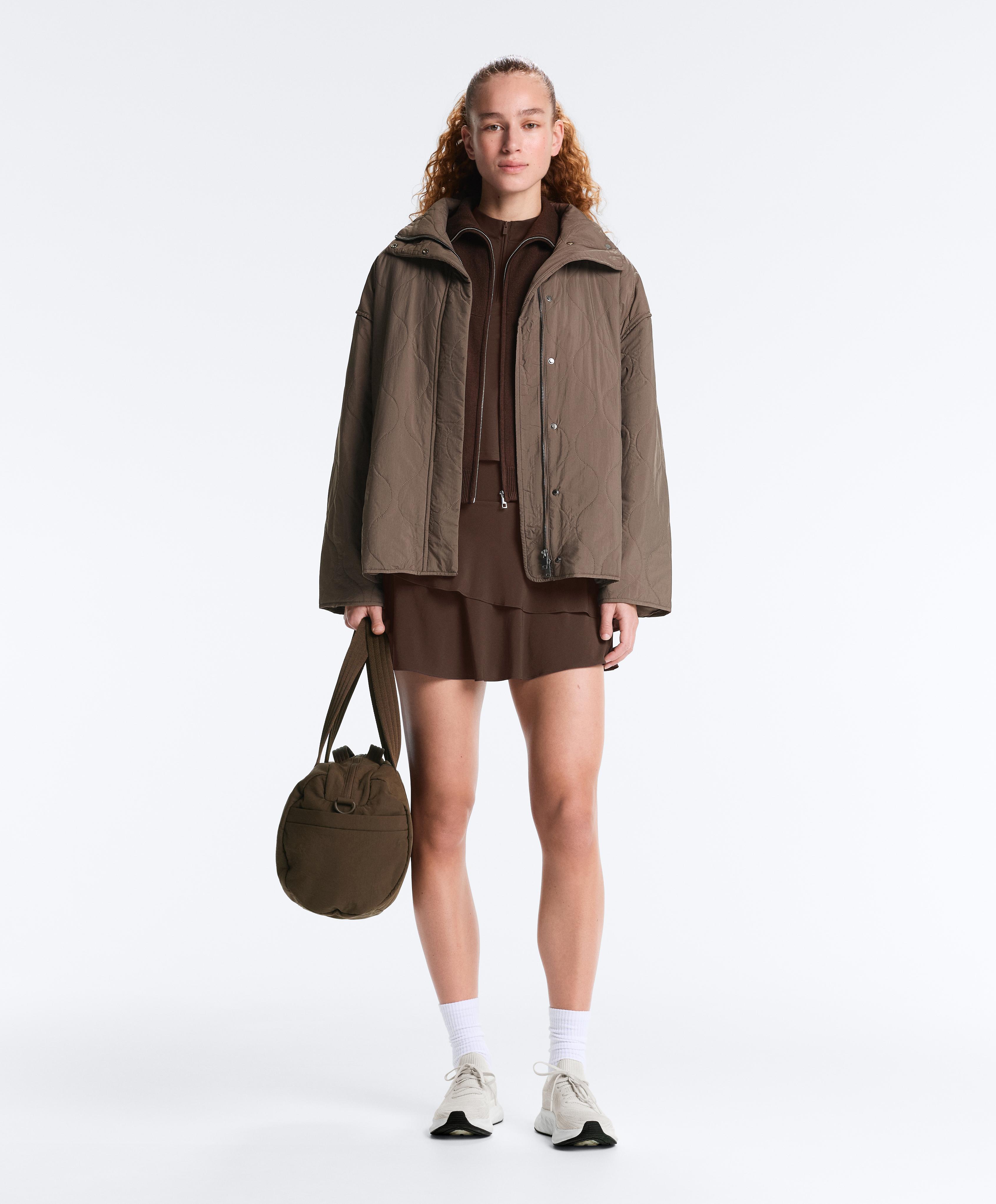 Half-zip sleeveless top — BROWN