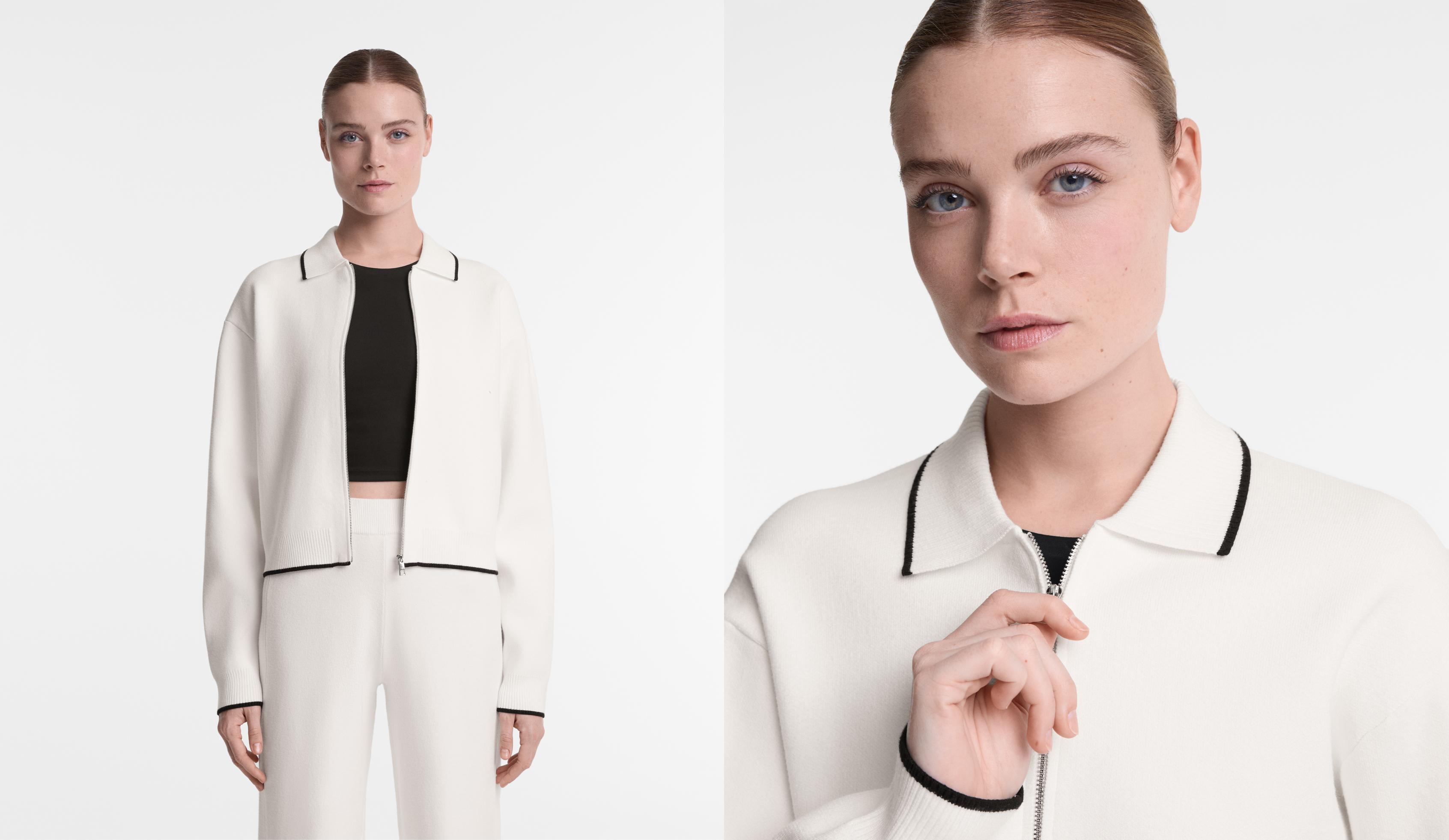 Long-sleeved knit jacket with collar and front zip fastening. Contrast detail at the cuffs, collar and hem.