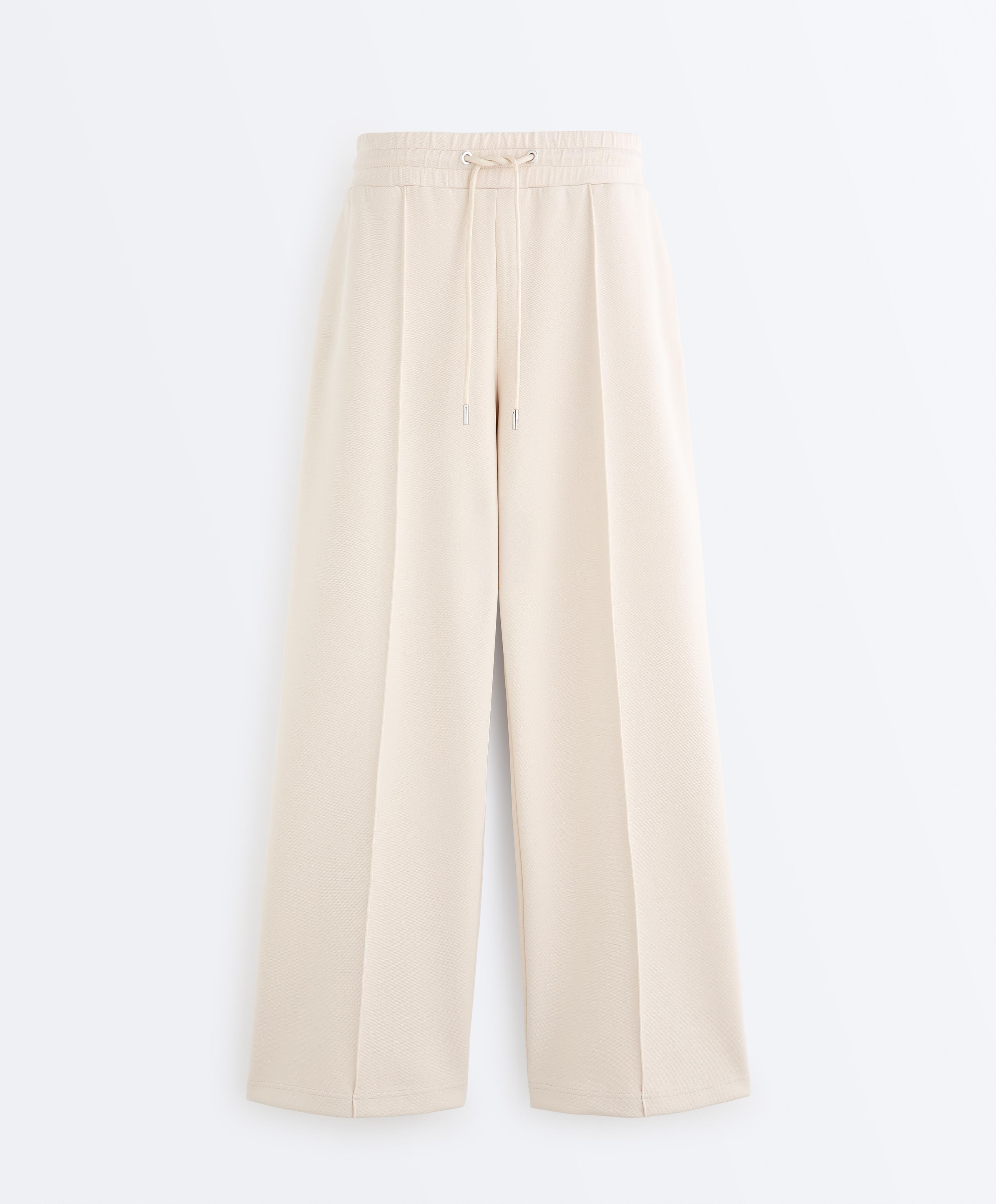 Cotton piqué straight-leg trousers with crease — PALE BEIGE
