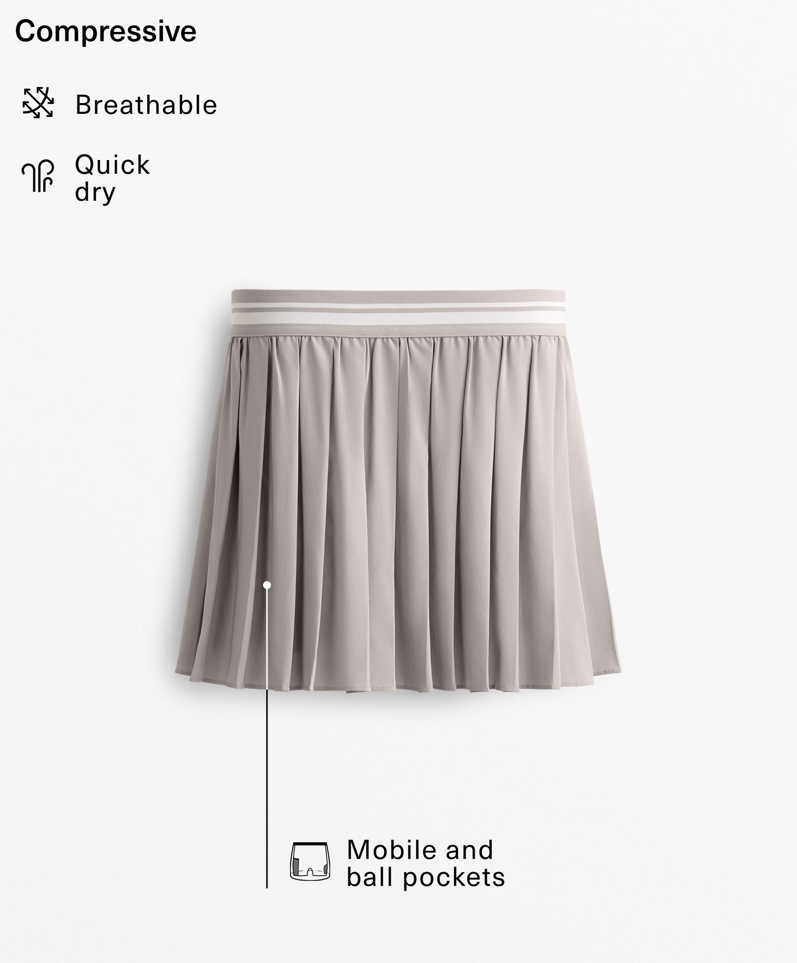 Pleated compressive skirt