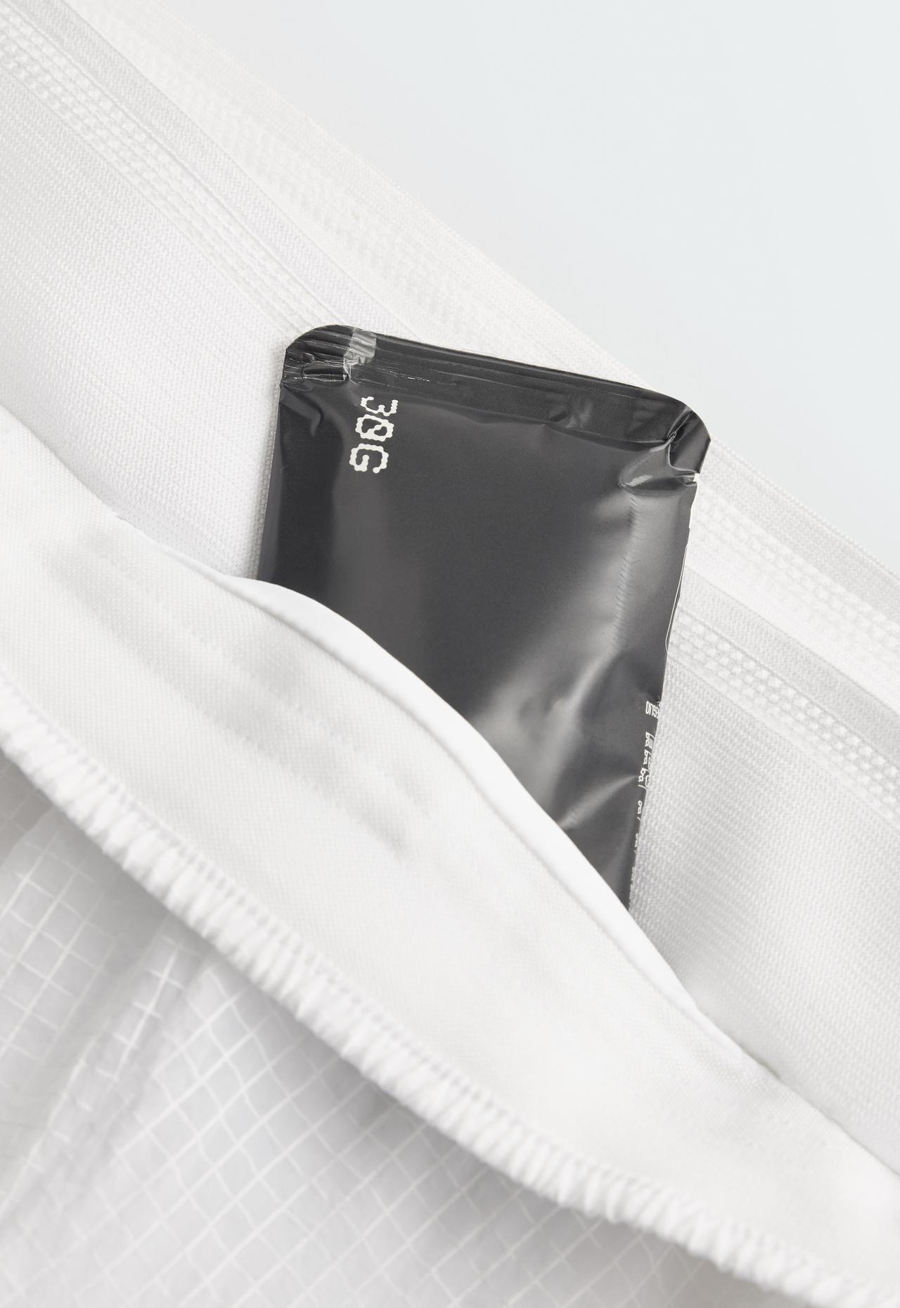 Technical 2-in-1 checked mid-rise shorts — WHITE 