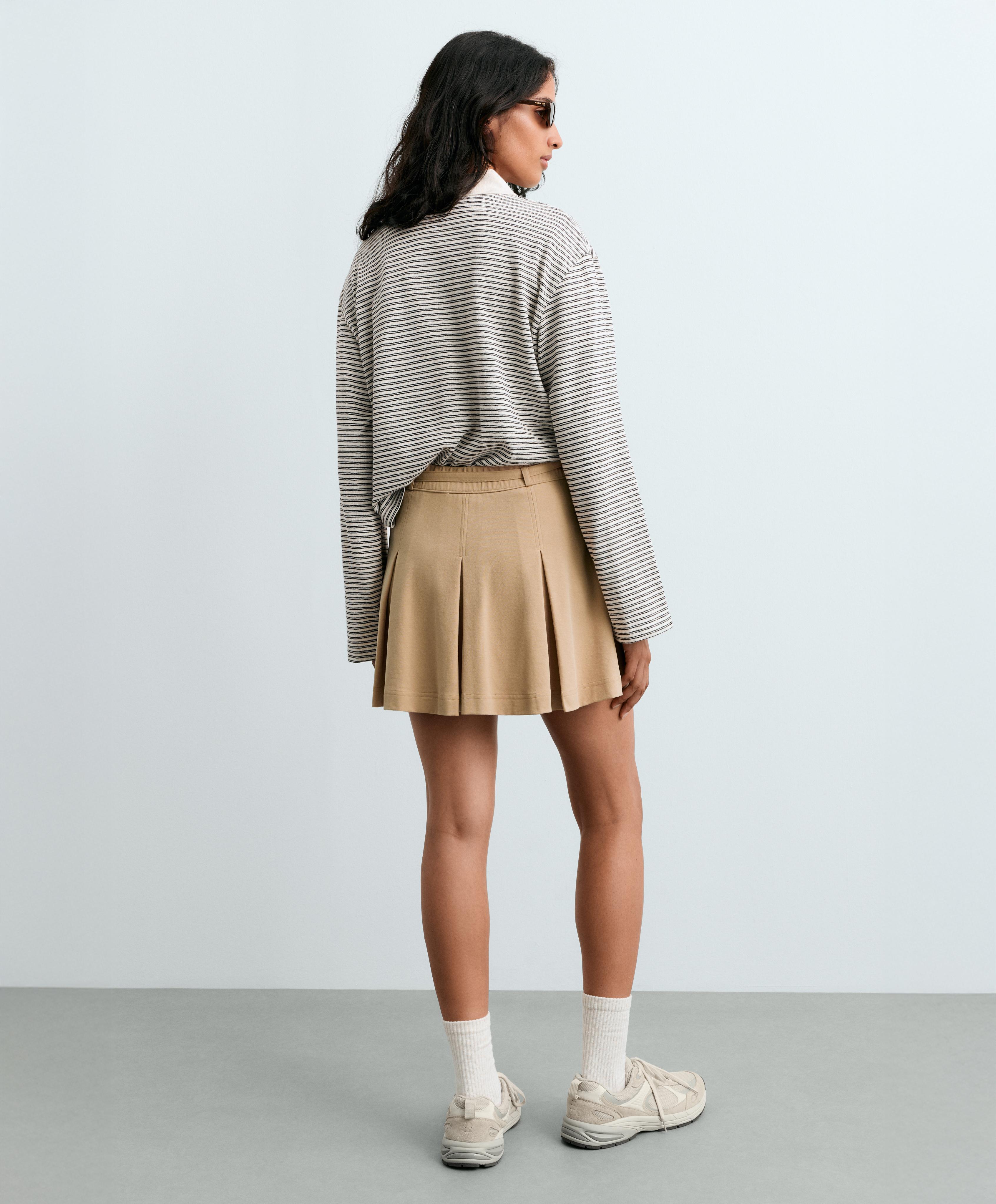 High-rise pleated short skirt with belt — BEIGE