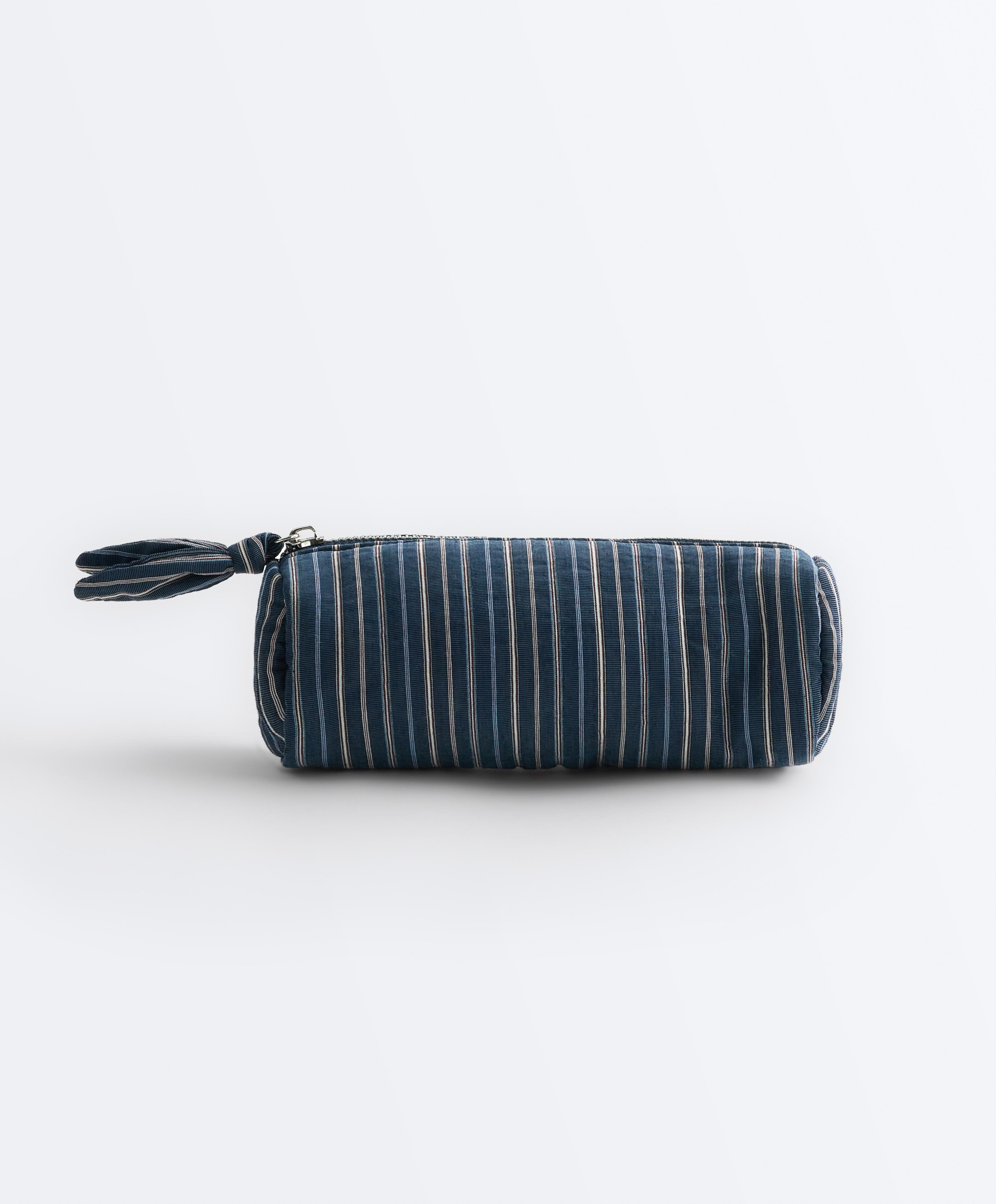 Sõlmega triibuline tualett-tarvete kott