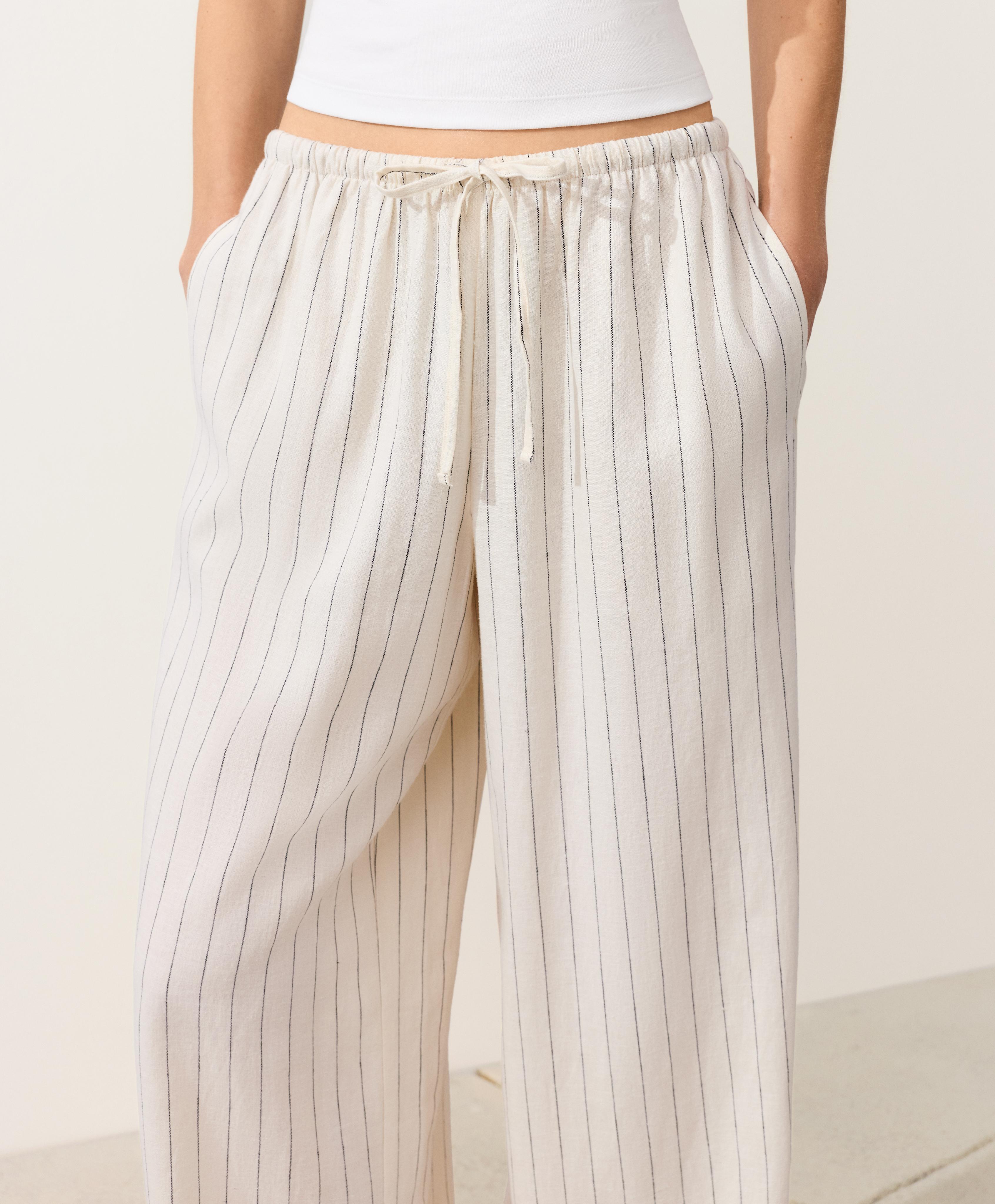 Pantalón recto detalle costura 100% lino Pantalón recto detalle costura 100% lino