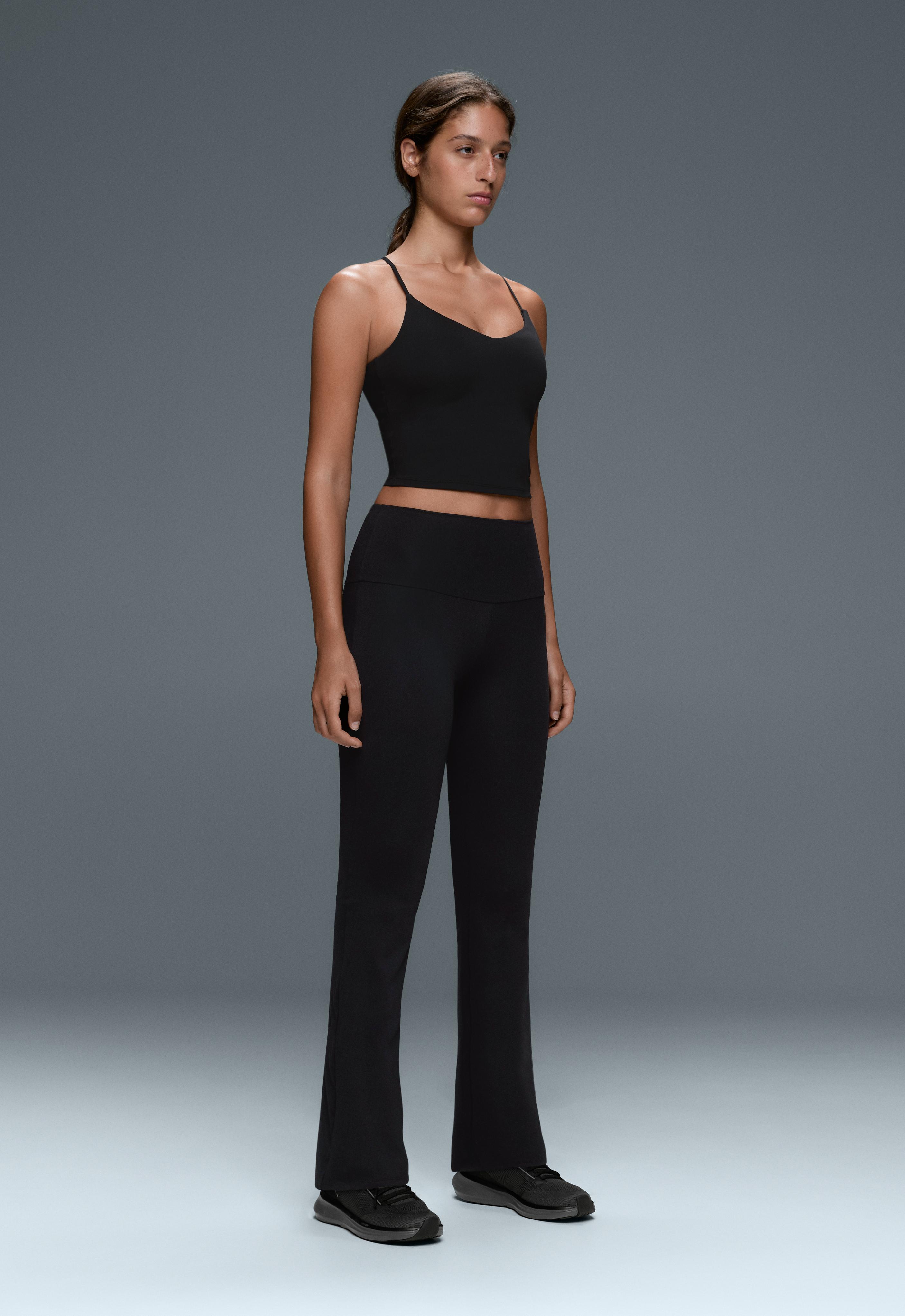 High-rise Comfortlux flare trousers — BLACK