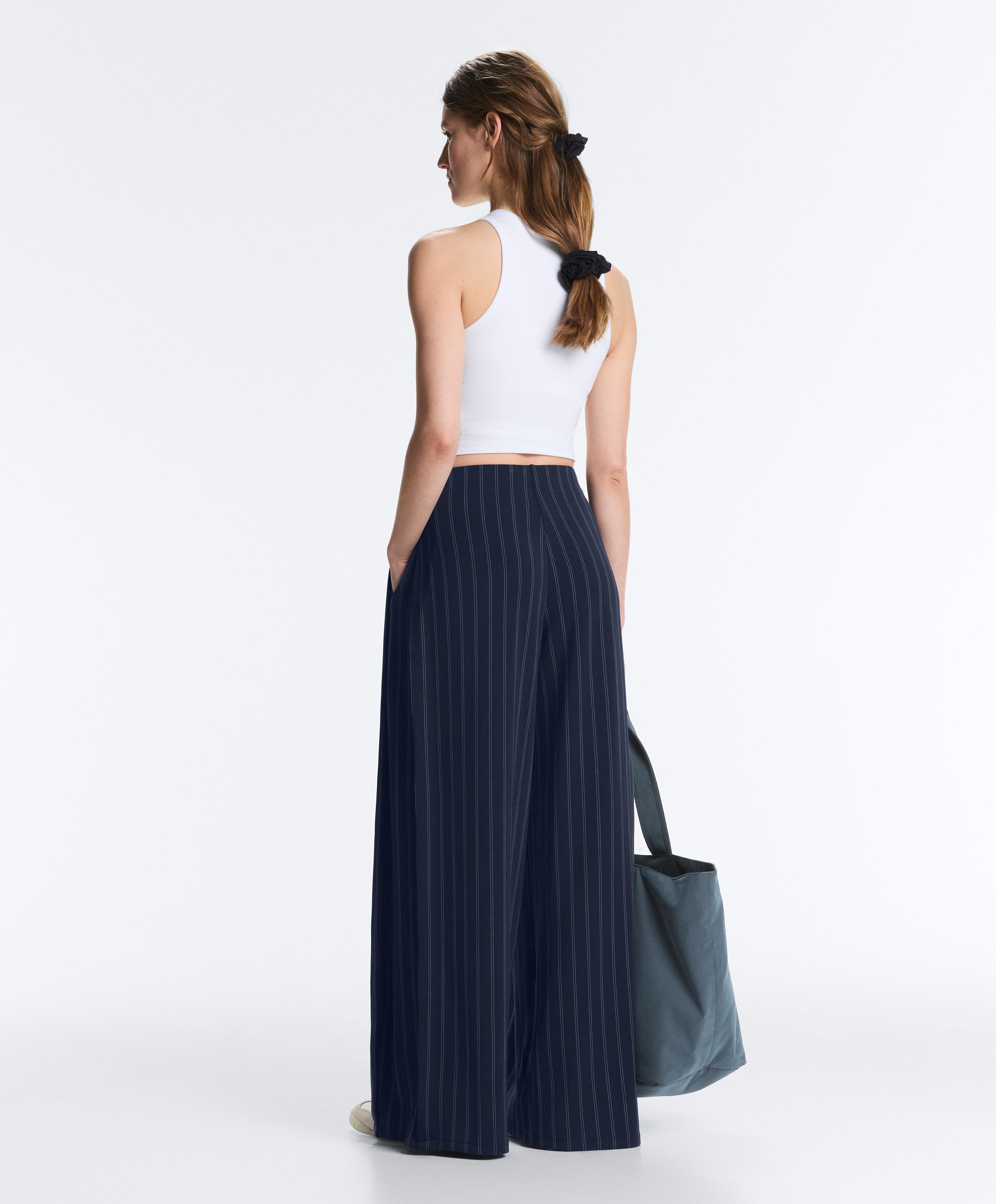 Blue soft-touch modal total look with wide side pleat
