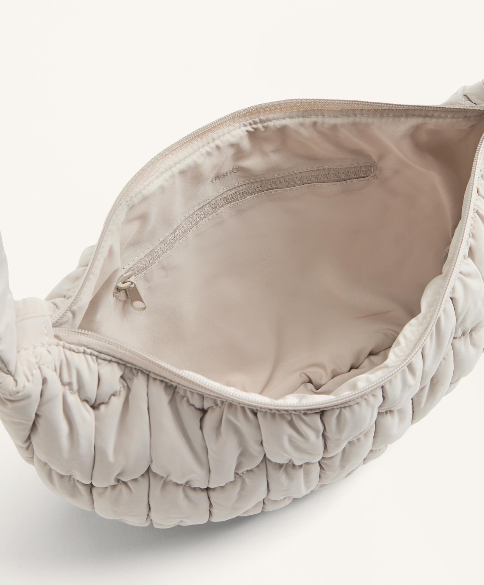 Стьобана сумка-слінг - Розпродаж Стьобана сумка-слінг - Розпродаж