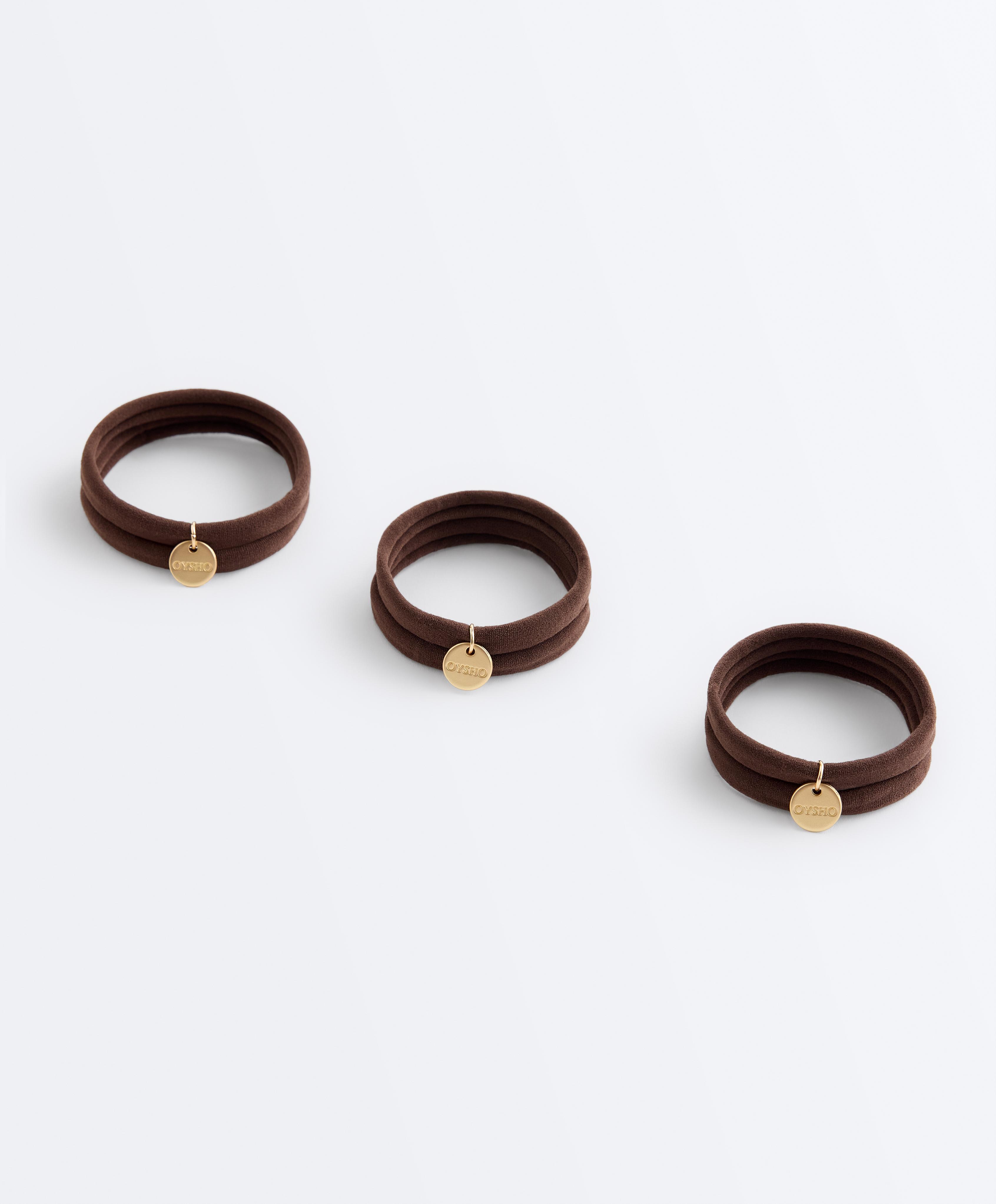 6 Oysho plaque hair ties